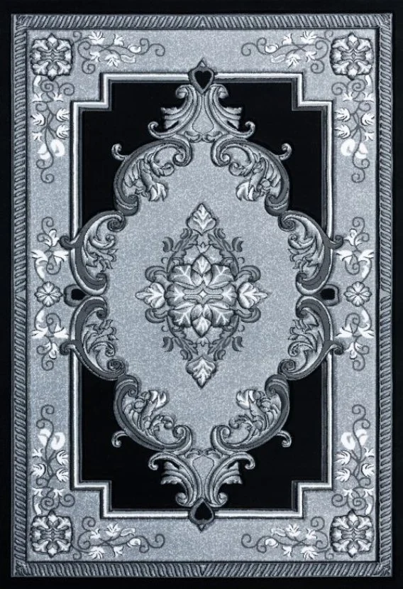 A decorative black and gray area rug with floral and ornate patterns arranged symmetrically.