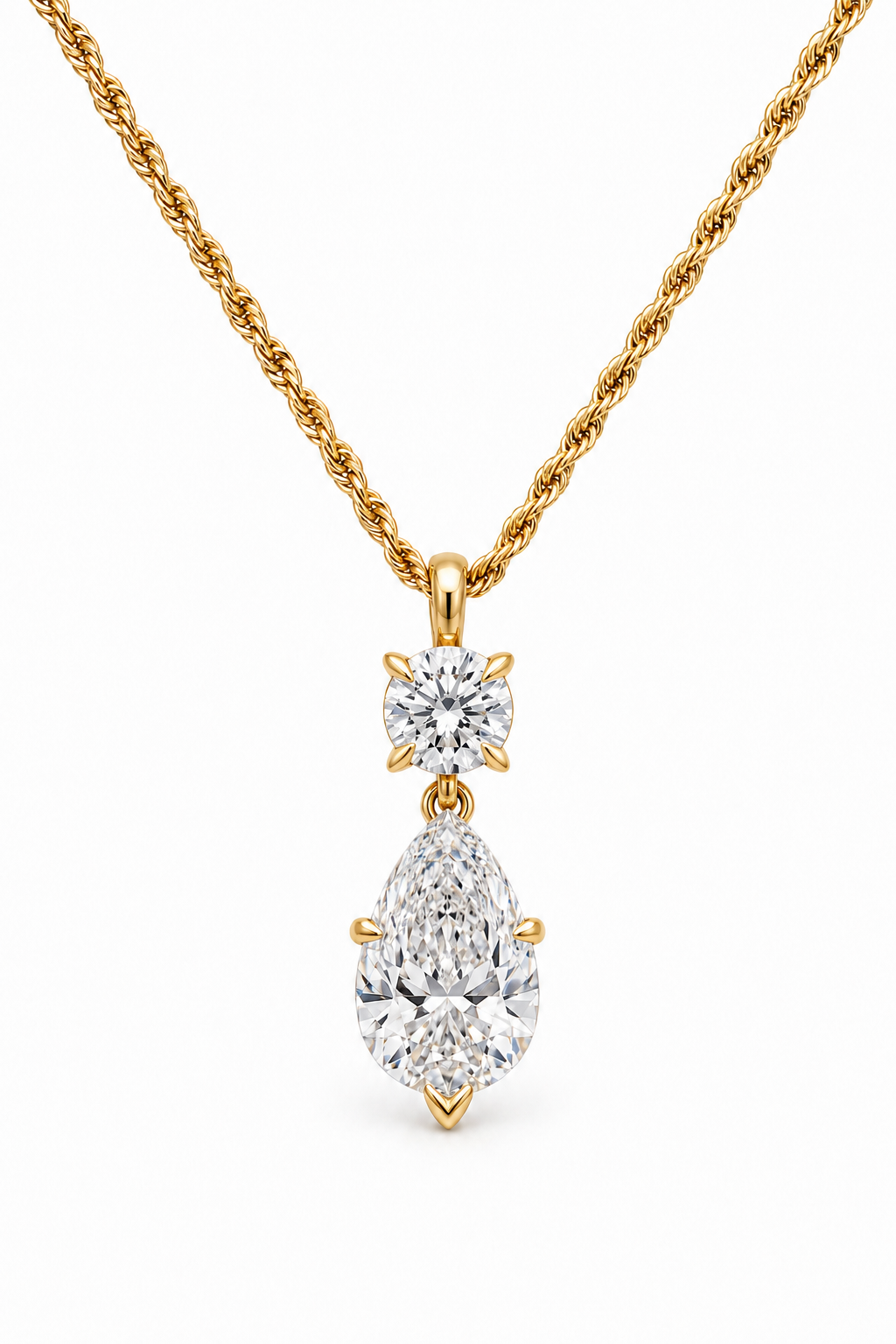 Yellow Gold Round to Pear Two Diamond Drop