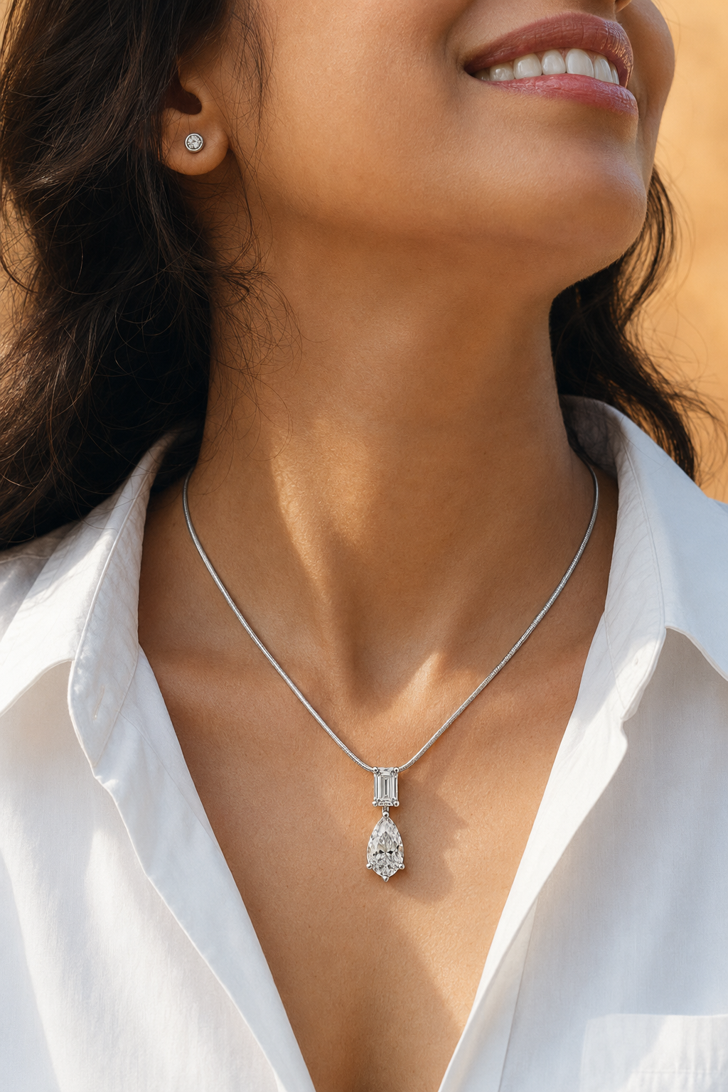 PN14_Lifestyle_White-Gold_Emerald-to-Pear-Linear-Drop.png