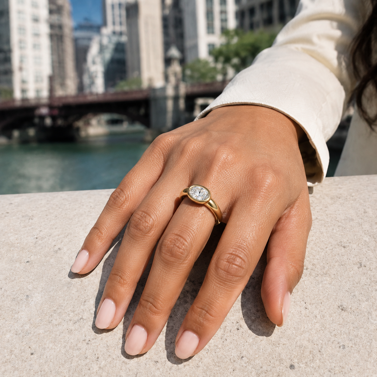 FR01B Lifestyle Yellow Gold East West Oval Bezel Ring.png