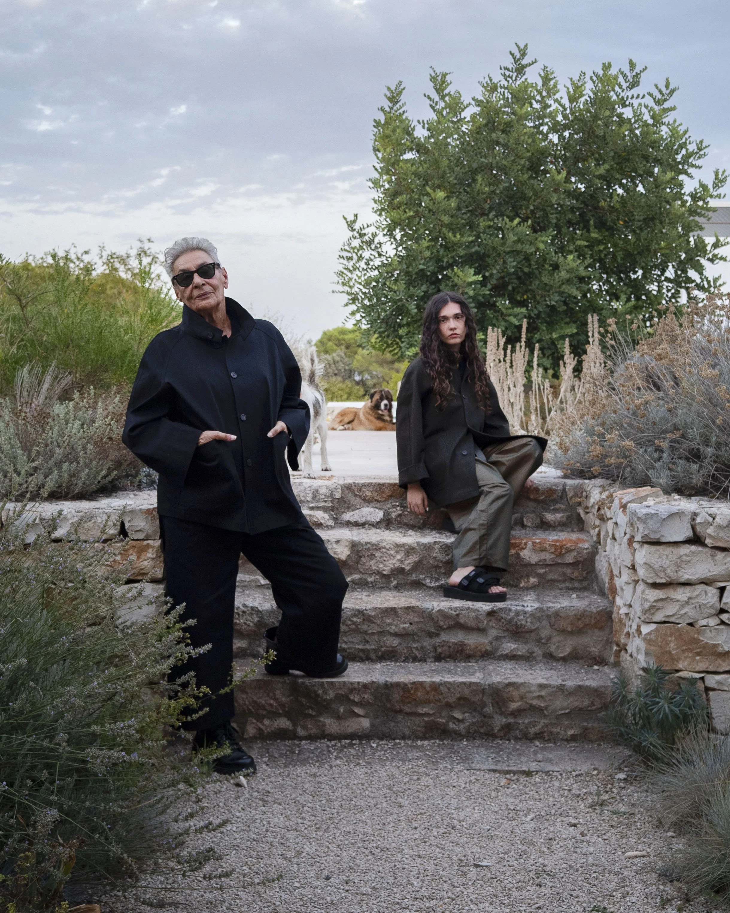 Maria Pia in Amalfi pantsuit and Robert in Torino coat with Bari pant