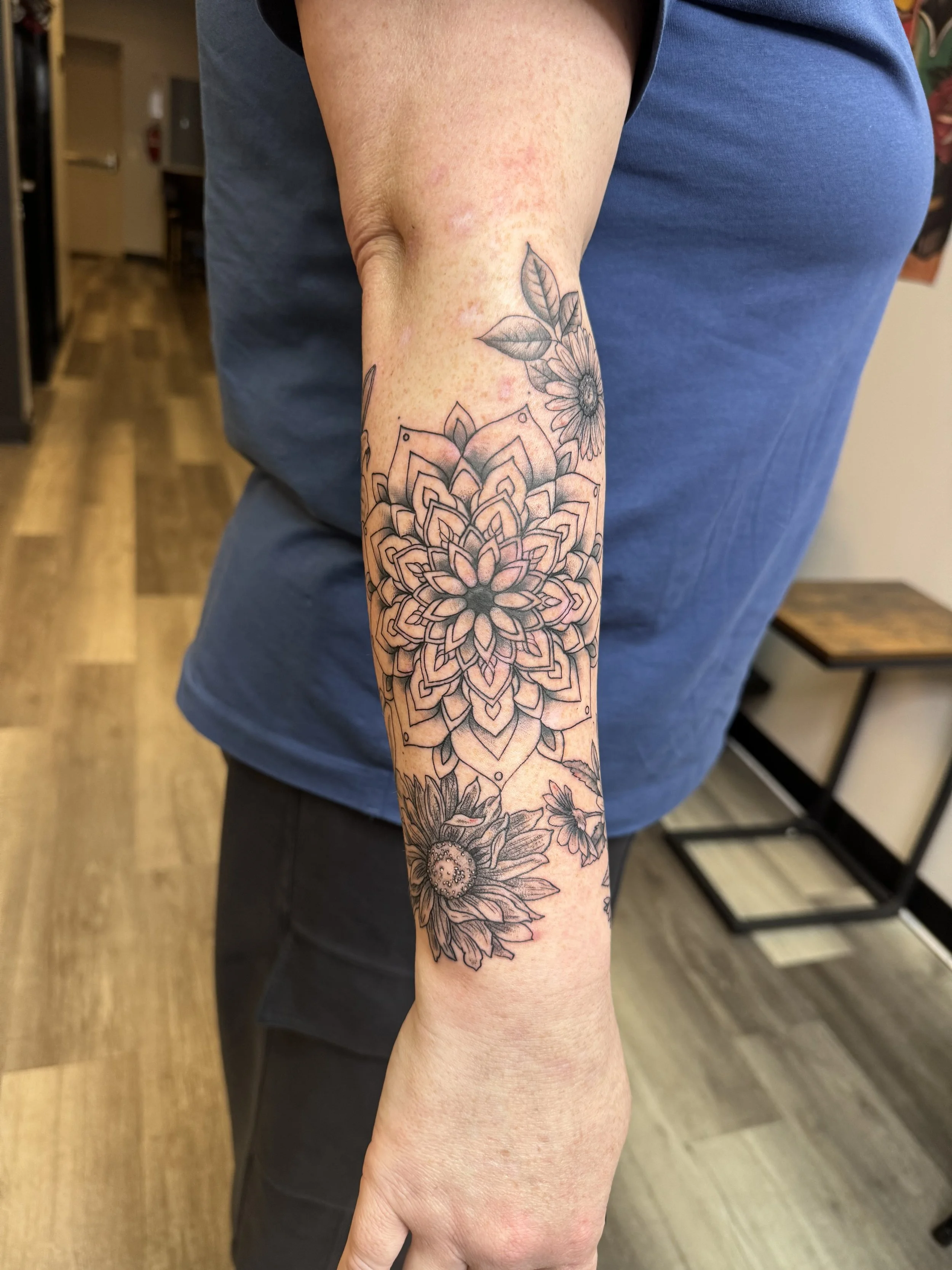 Mandala with floral tattoo