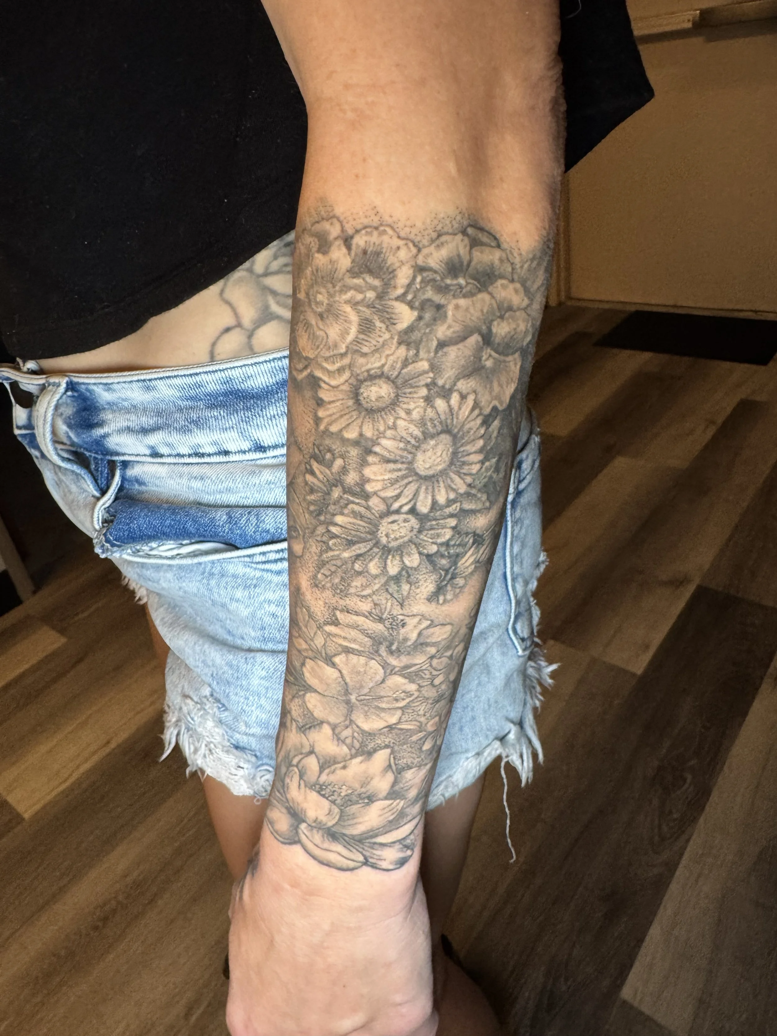 Healed floral tattoo