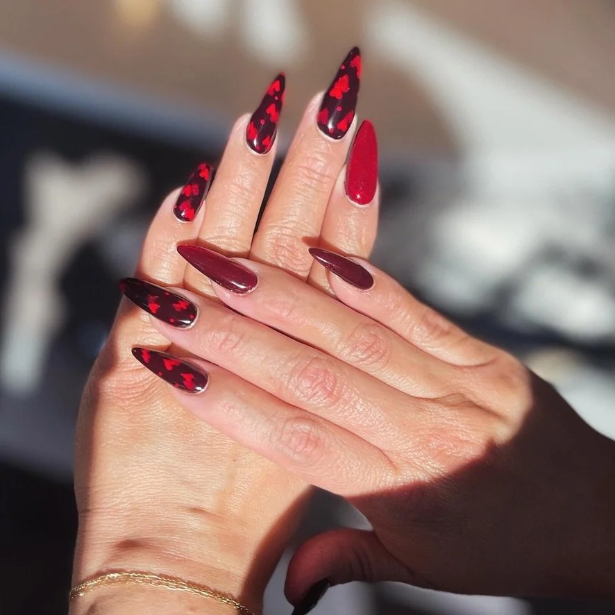 Gel-x soft gel extensions with cat-eye nail art.