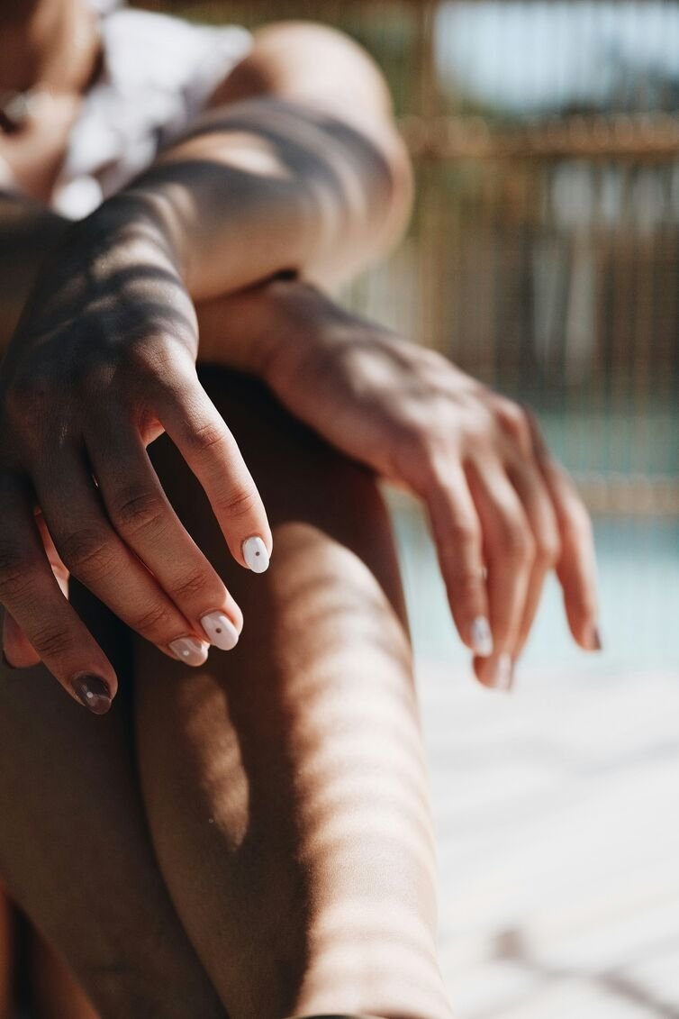 Shows beautiful nails at beauty bar Highlands Ranch