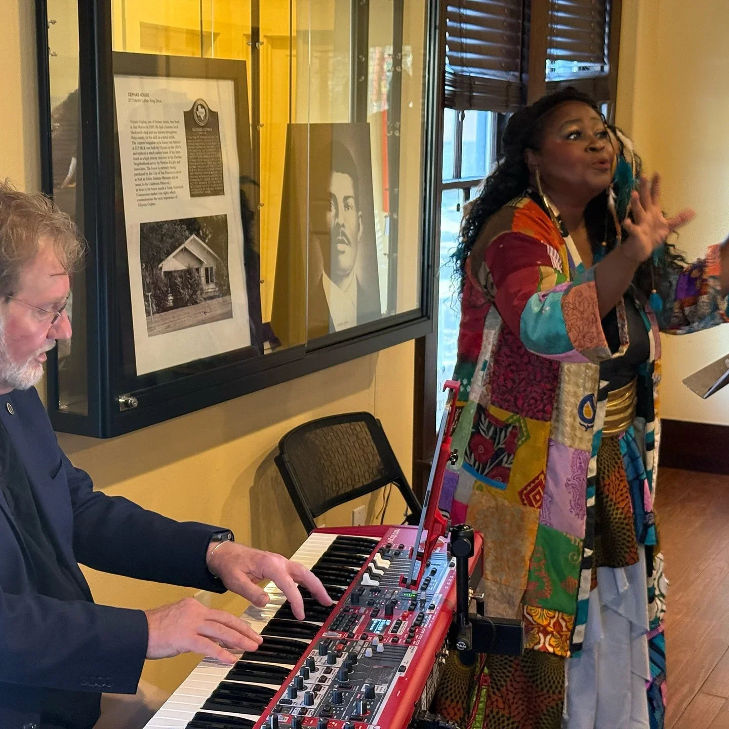 Jazz pianist Hank Hehmsoth performing live improvisation with poet Jacqueline Miller during a Jazz and Poetry interdisciplinary performance at the historic Cephas House in San Marcos Texas.