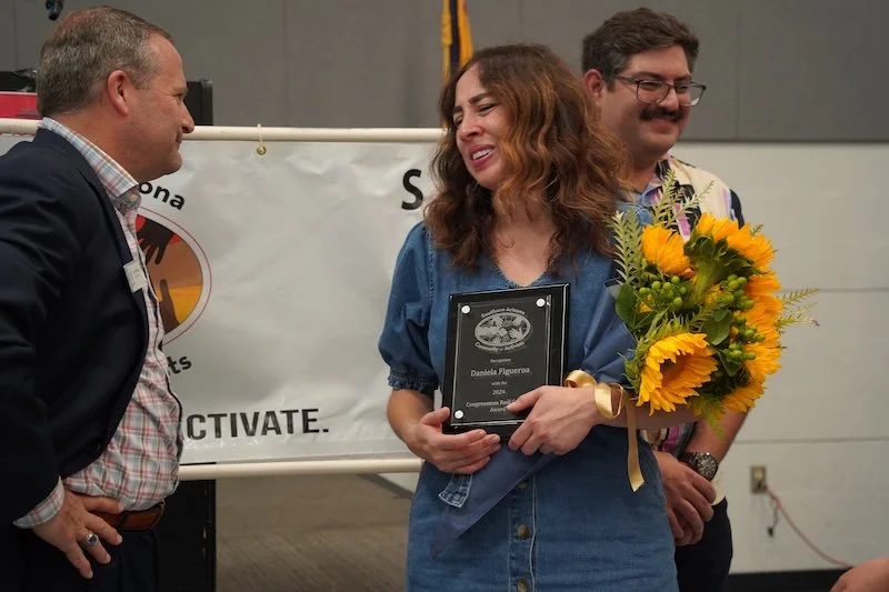 Daniel Figueroa with award.