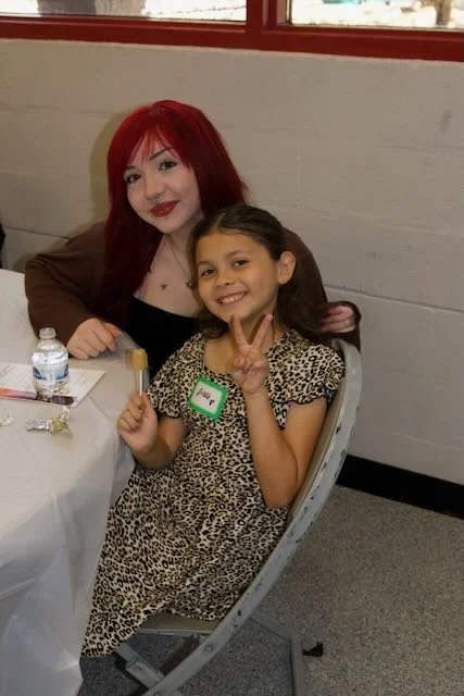 Arielle was the Ticket Picker for the  50/50 Raffle 