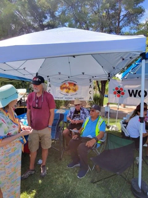 Russ Crossan and Henry Trejo manning tent