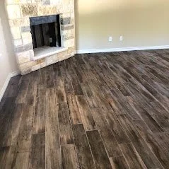 Wood Look Porcelain Tile  and a stone fireplace