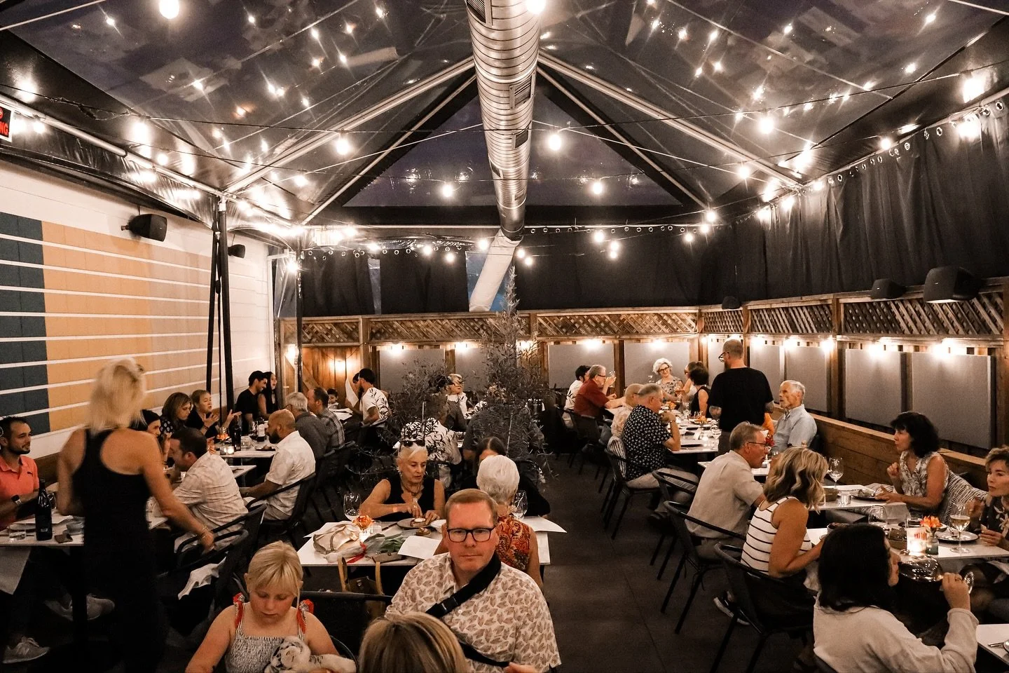 You could stay home and scroll&hellip;
or you could be here.
Heated patio, blues and funk,
wine flowing, burrata melting, pasta that ruins you for anywhere else. Sean Carscadden&rsquo;s playing, the night&rsquo;s wide open &mdash;
this is the move. C