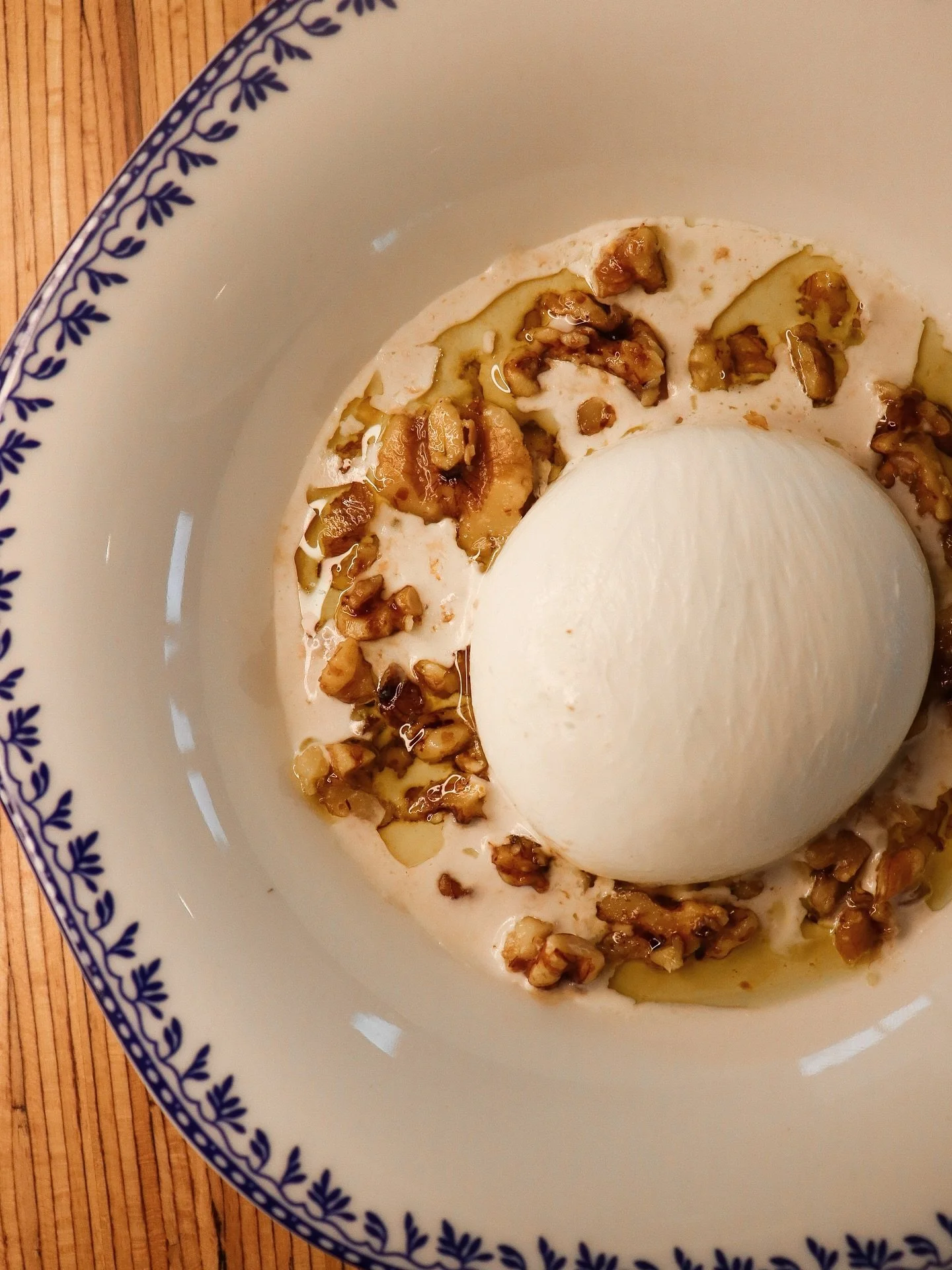 Let&rsquo;s talk burrata. Because pretending this is just another appetizer would be dishonest.

A cloud-soft ball from Puglia, flown in with all its creamy intentions intact. You crack into it and it does that quiet collapse thing, rich cream spilli