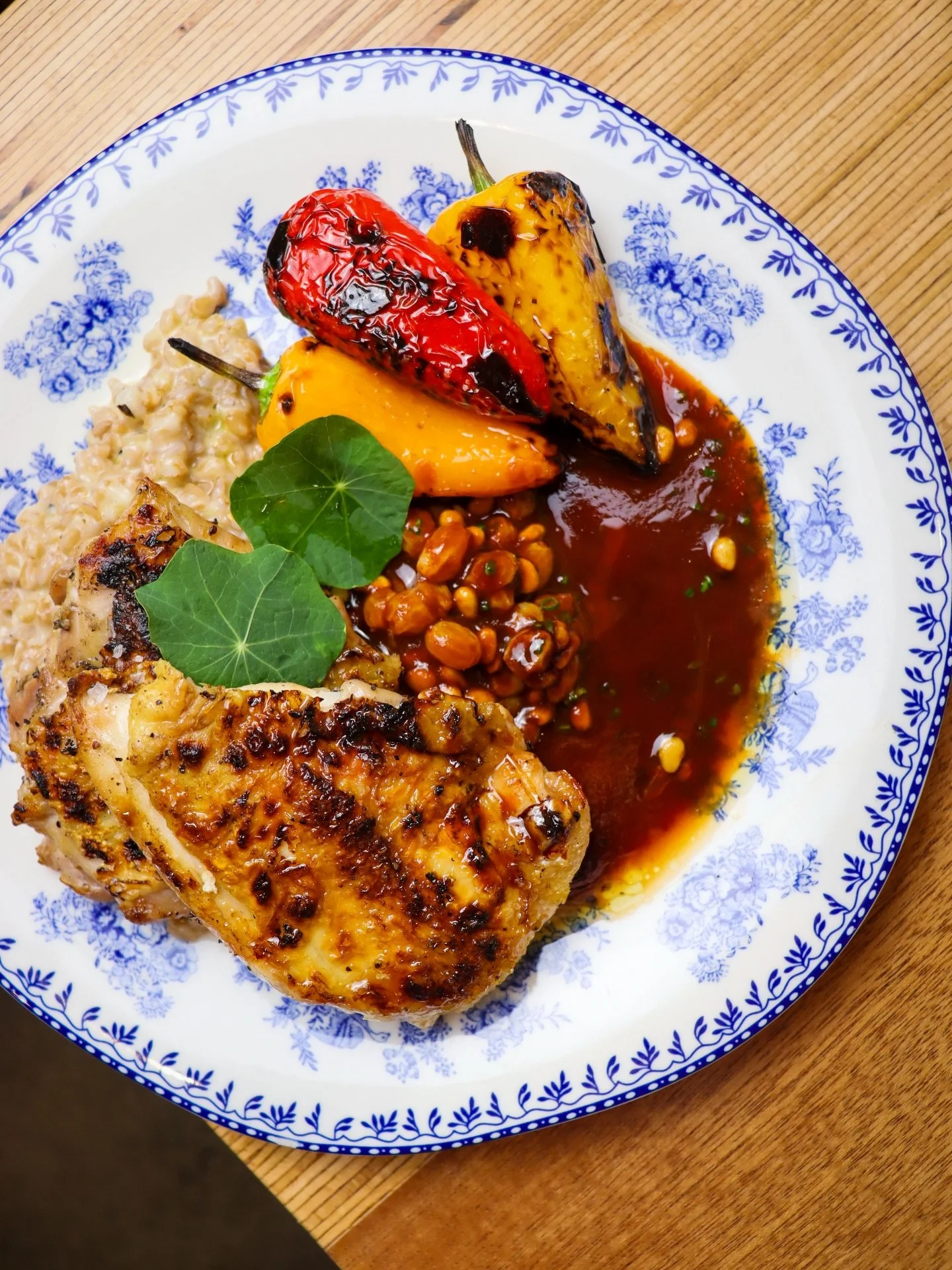 What&rsquo;s Sunday without a chicken dinner? 🍽️ 
wood grilled petaluma chicken | golden raisin agrodolce | blistered sweet peppers | green garlic farrotto | pecorino | pignoli nuts

REMINDER ‼️
Every Sunday we have our Sunday Supper Pre-Fixe Menu
3