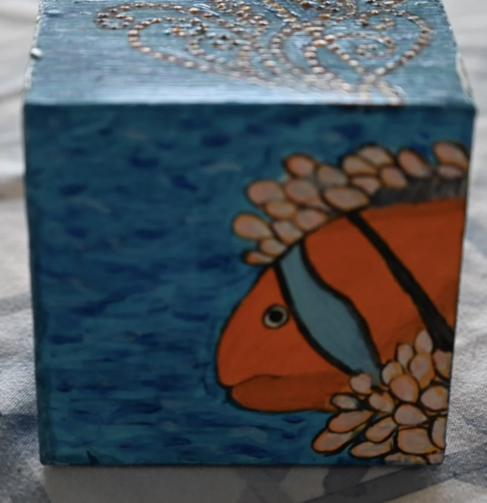 ClownFish_5x5x3..25in_MixedMediaonRepurposedBox_Bpie.jpg