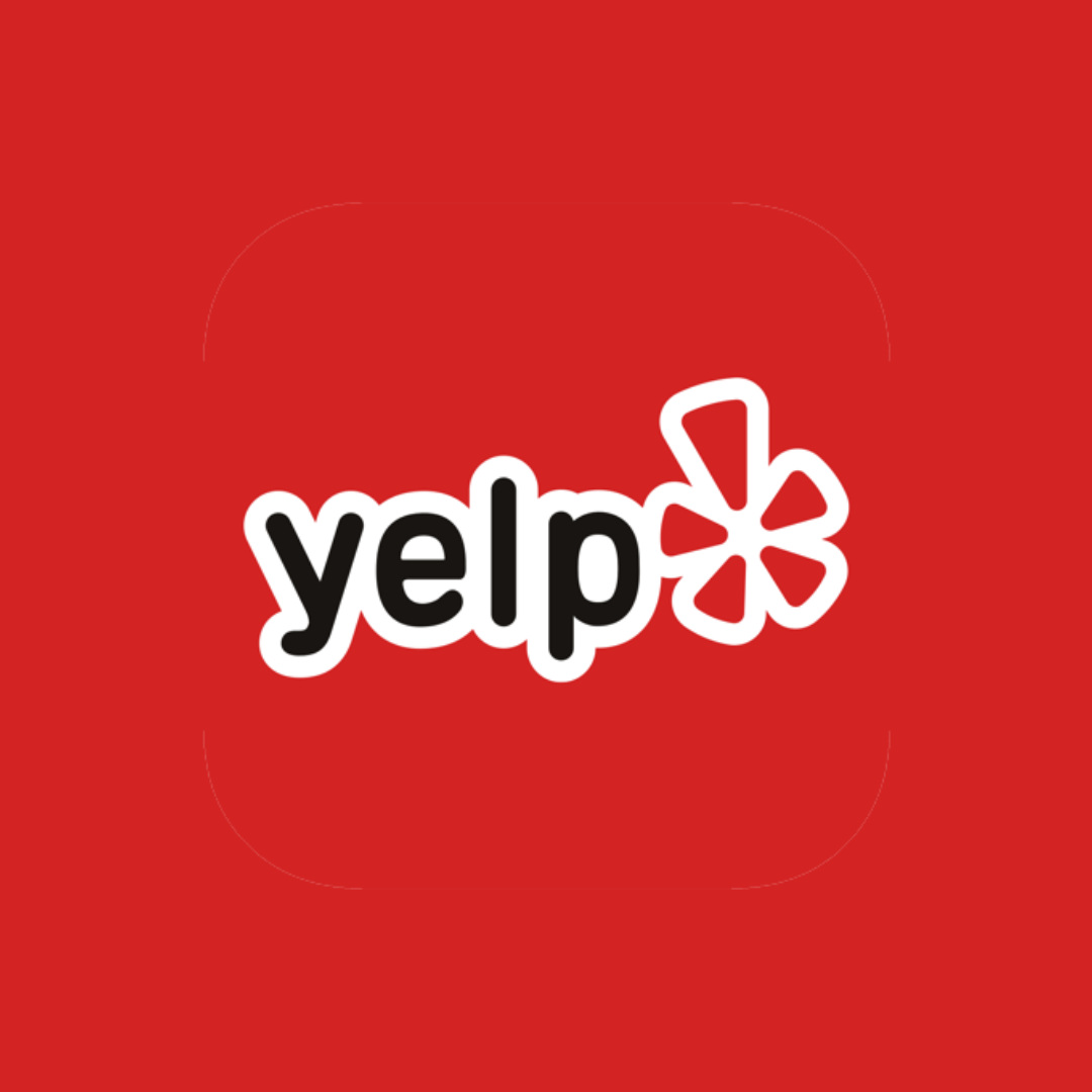 Yelp logo with red background and white and black text.