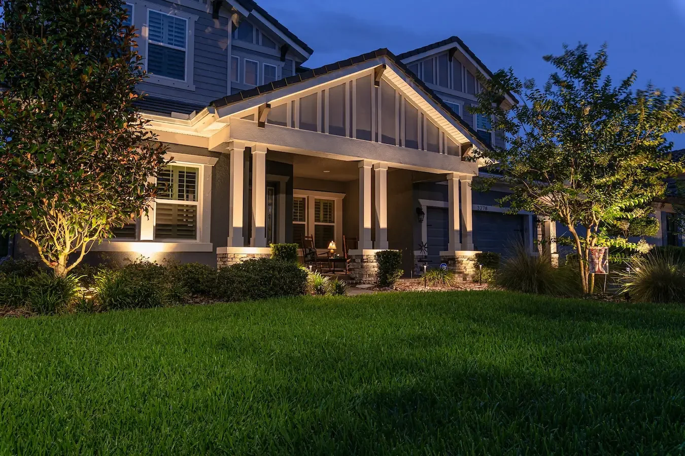 This craftsman style home features simple illumination of it's focal point columns. The upper stories are planned for a later project.