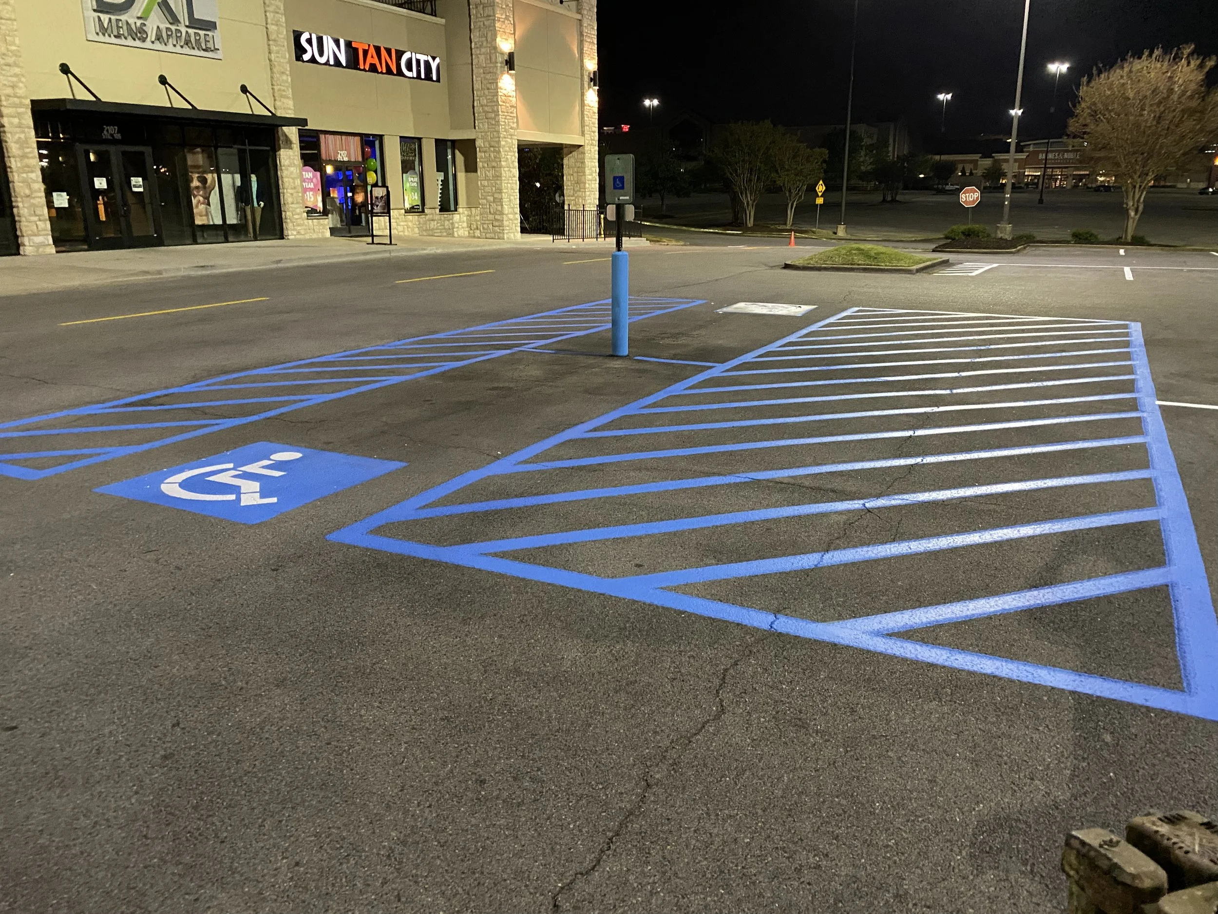 a handicap parking and no parking zone to accomodate unloading/loading for ADA reasons. this was done in a local strip mall by DMI striping experts