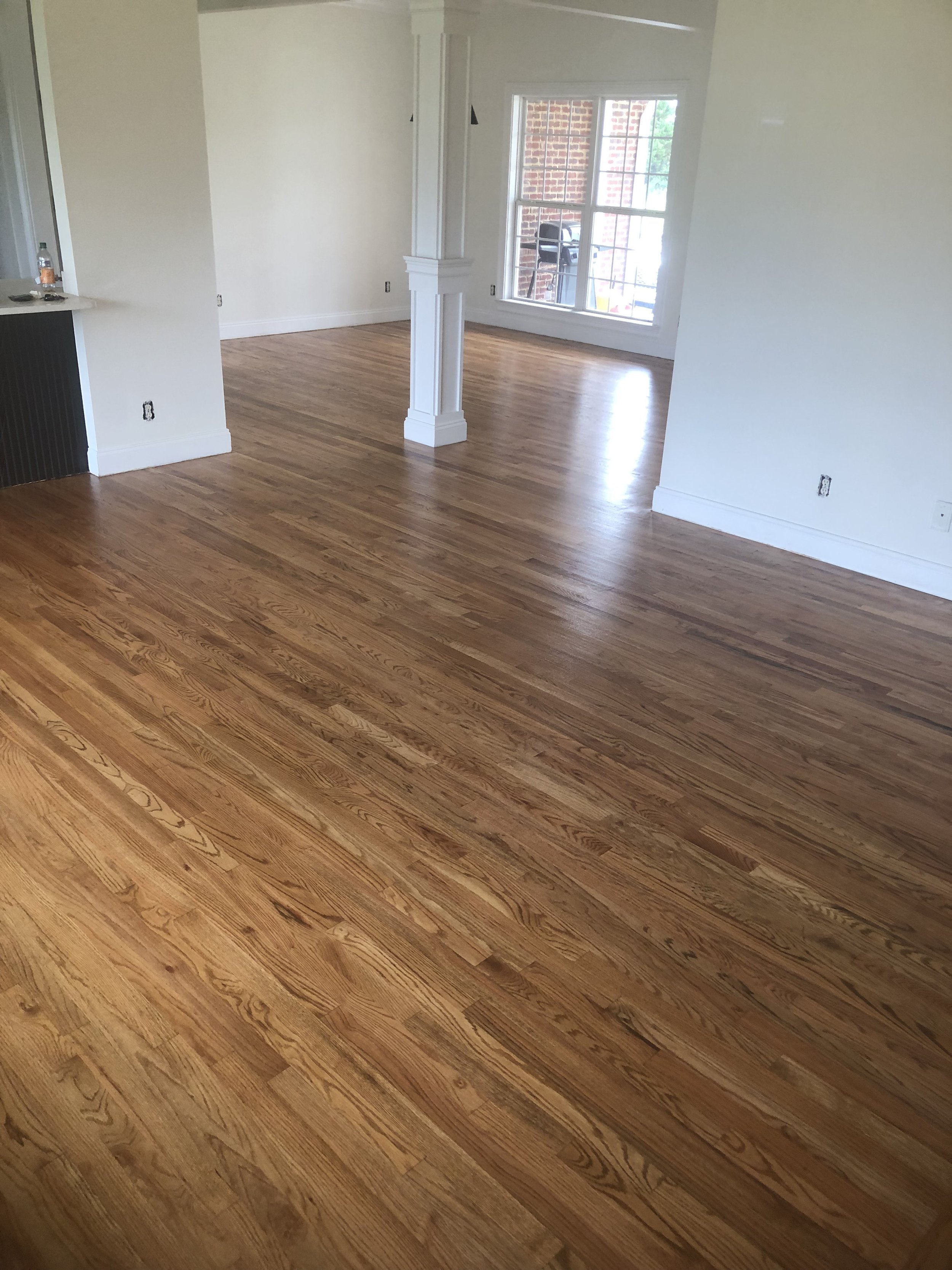 Hardwood flooring restoration inside a townhome in Chattanooga, Tennessee. Installed by DMI Flooring and Maintenance