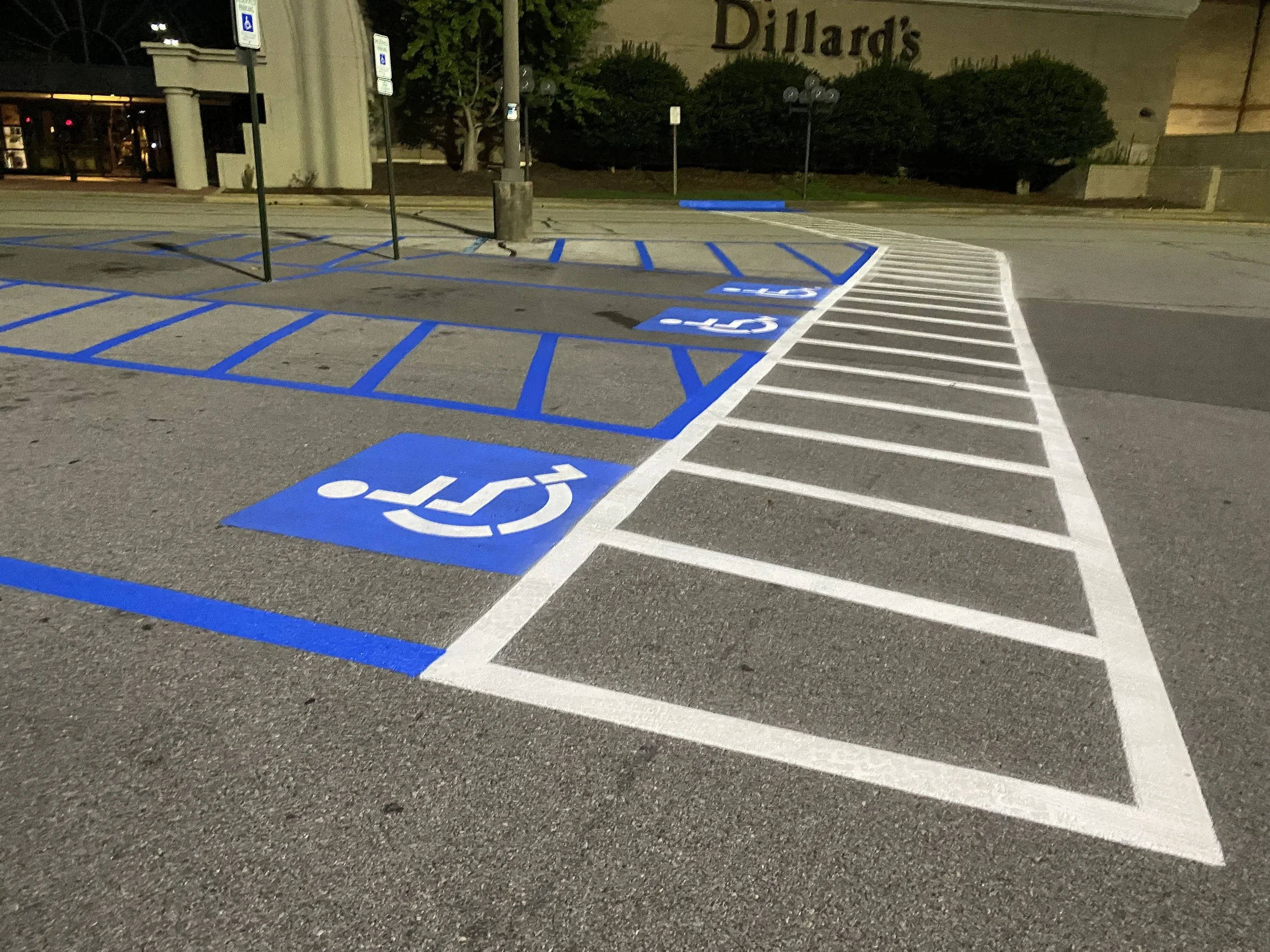 Handicap parking zone striping and clear, straight, line work for walk ways done by DMI flooring