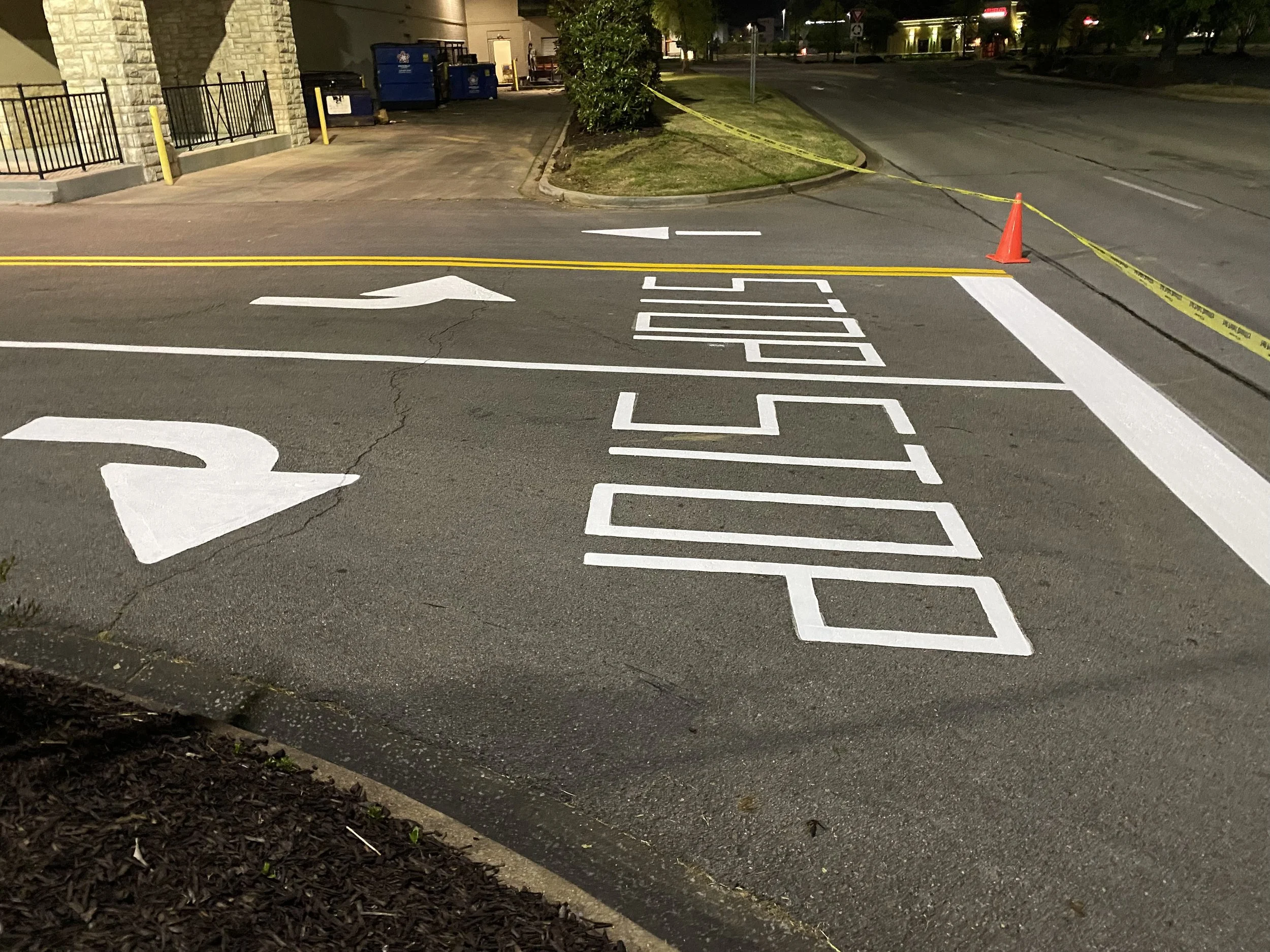 Mall entry and exit striping, showing clear and legible signing on the road