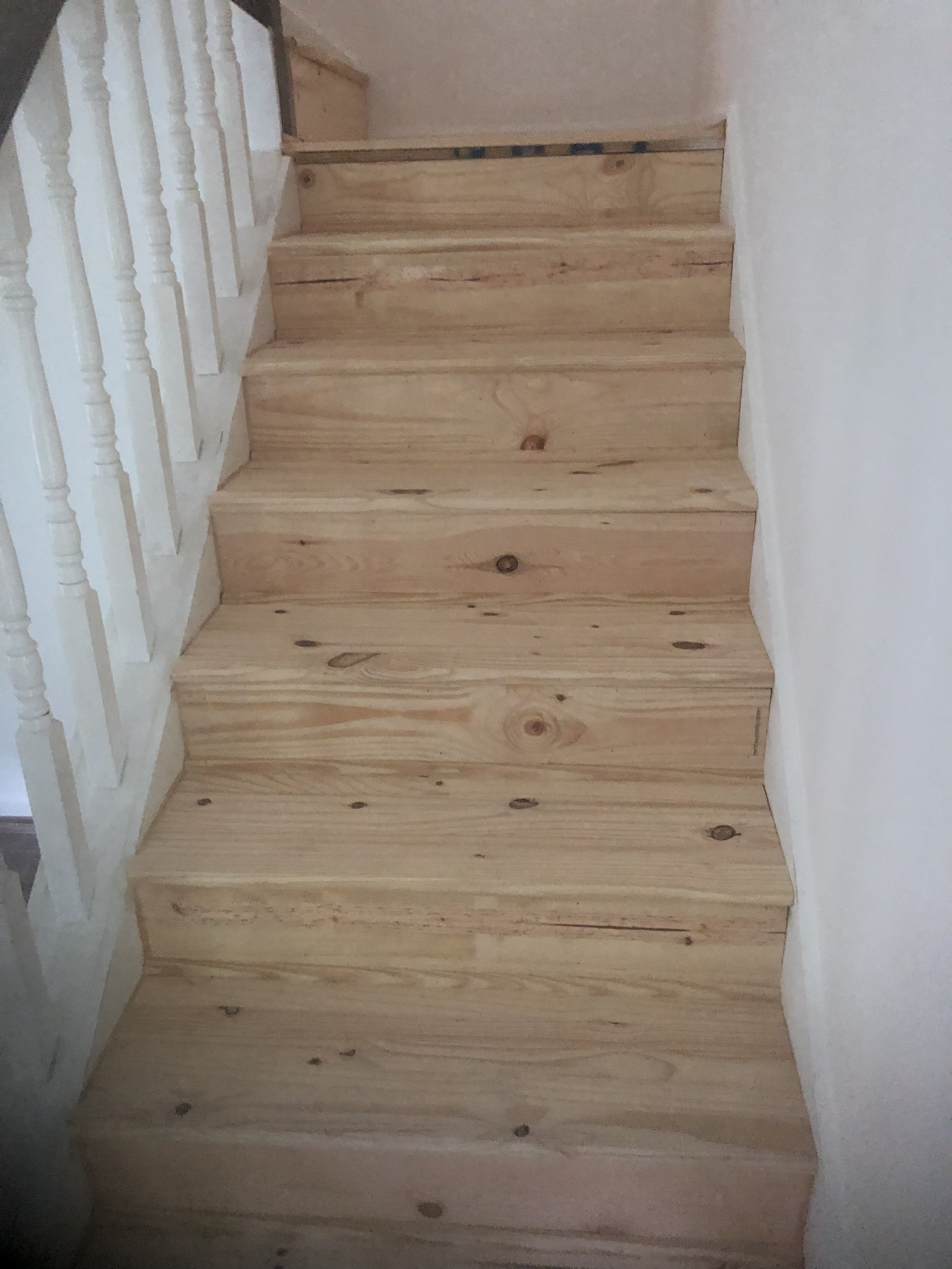 Hardwood flooring install on some stairs inside a townhome in Chattanooga, Tennessee. Installed by DMI Flooring and Maintenance