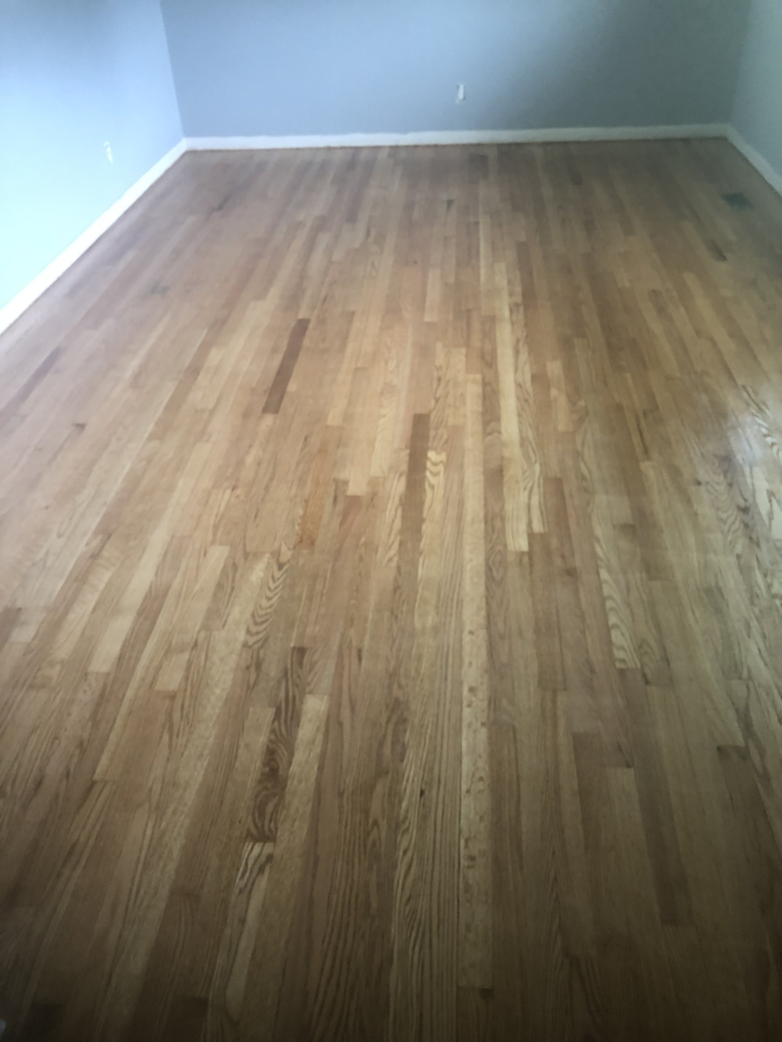 Hardwood flooring install inside a townhome in Chattanooga, Tennessee. Installed by DMI Flooring and Maintenance