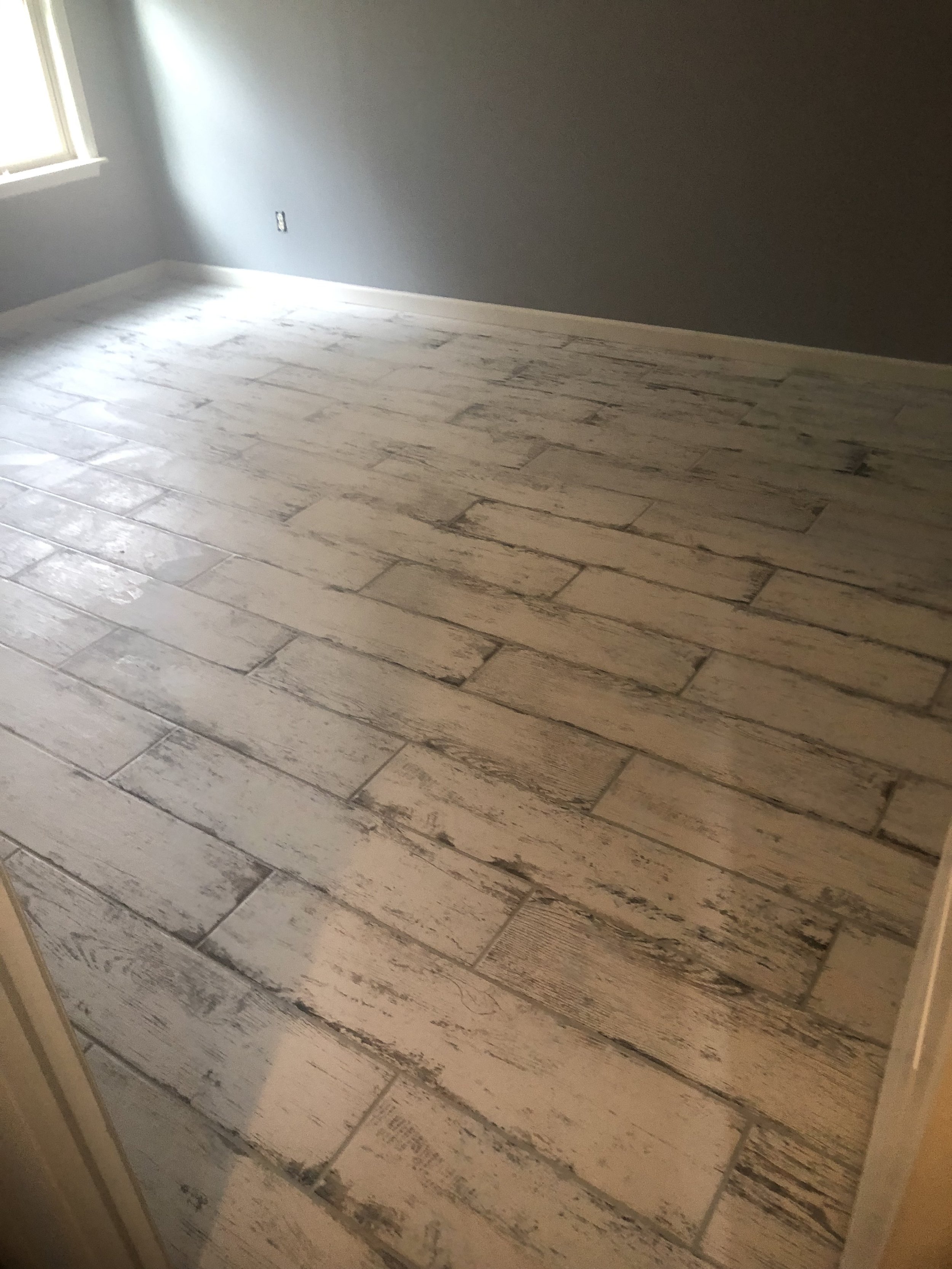 Hardwood flooring install inside a townhome in Chattanooga, Tennessee. Installed by DMI Flooring and Maintenance