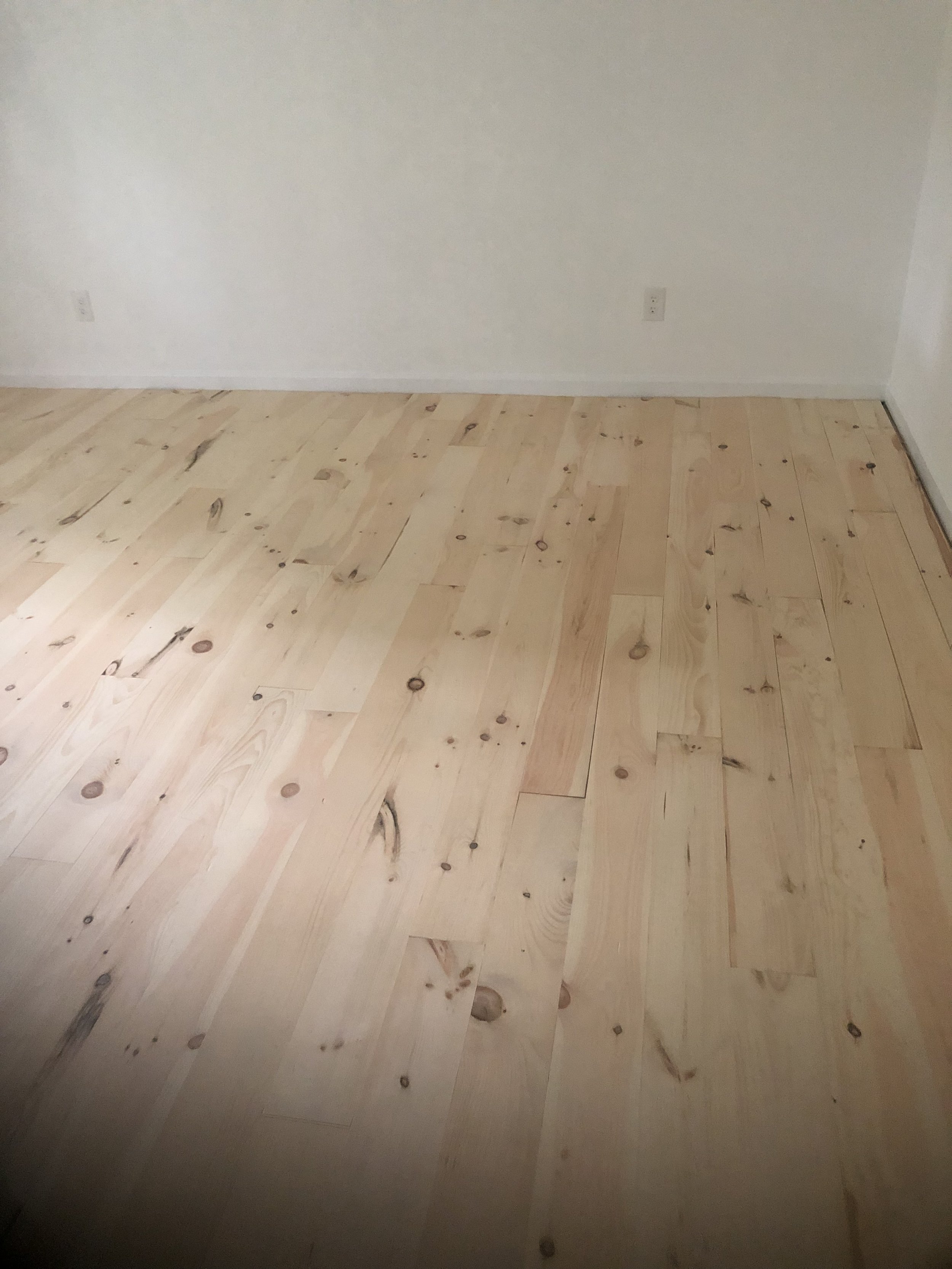 Hardwood flooring install inside a townhome in Chattanooga, Tennessee. Installed by DMI Flooring and Maintenance