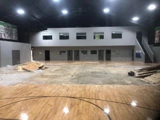 Large scale floor demolition performed on a gymnasium by DMI.