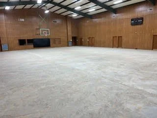 Large scale floor demolition performed on a gymnasium by DMI.