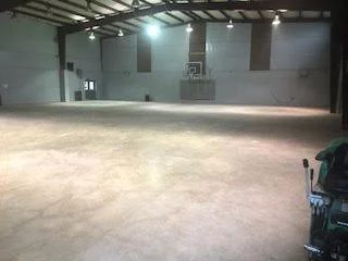 Large scale floor demolition performed on a gymnasium by DMI.