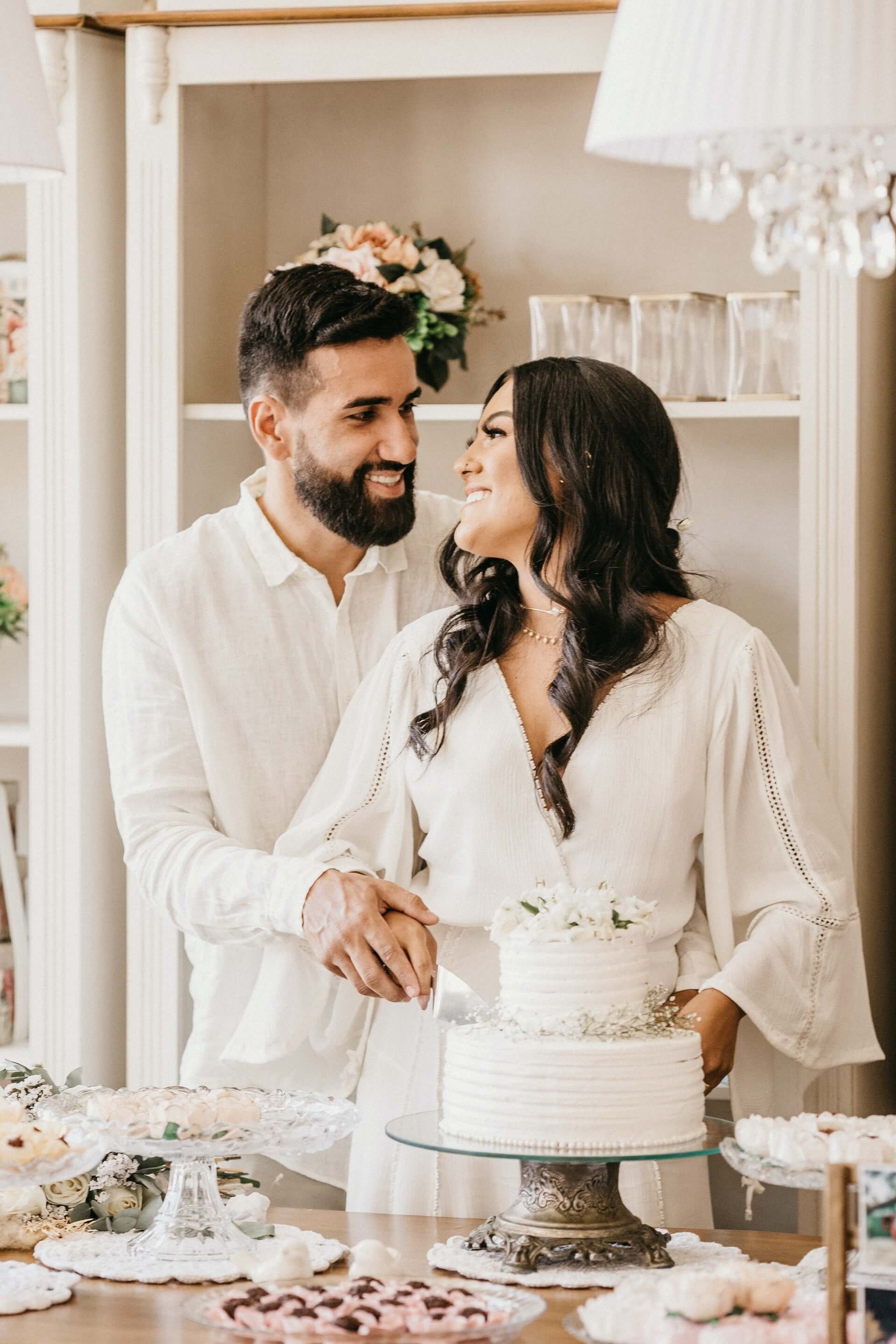 Wedding couple cutting cake