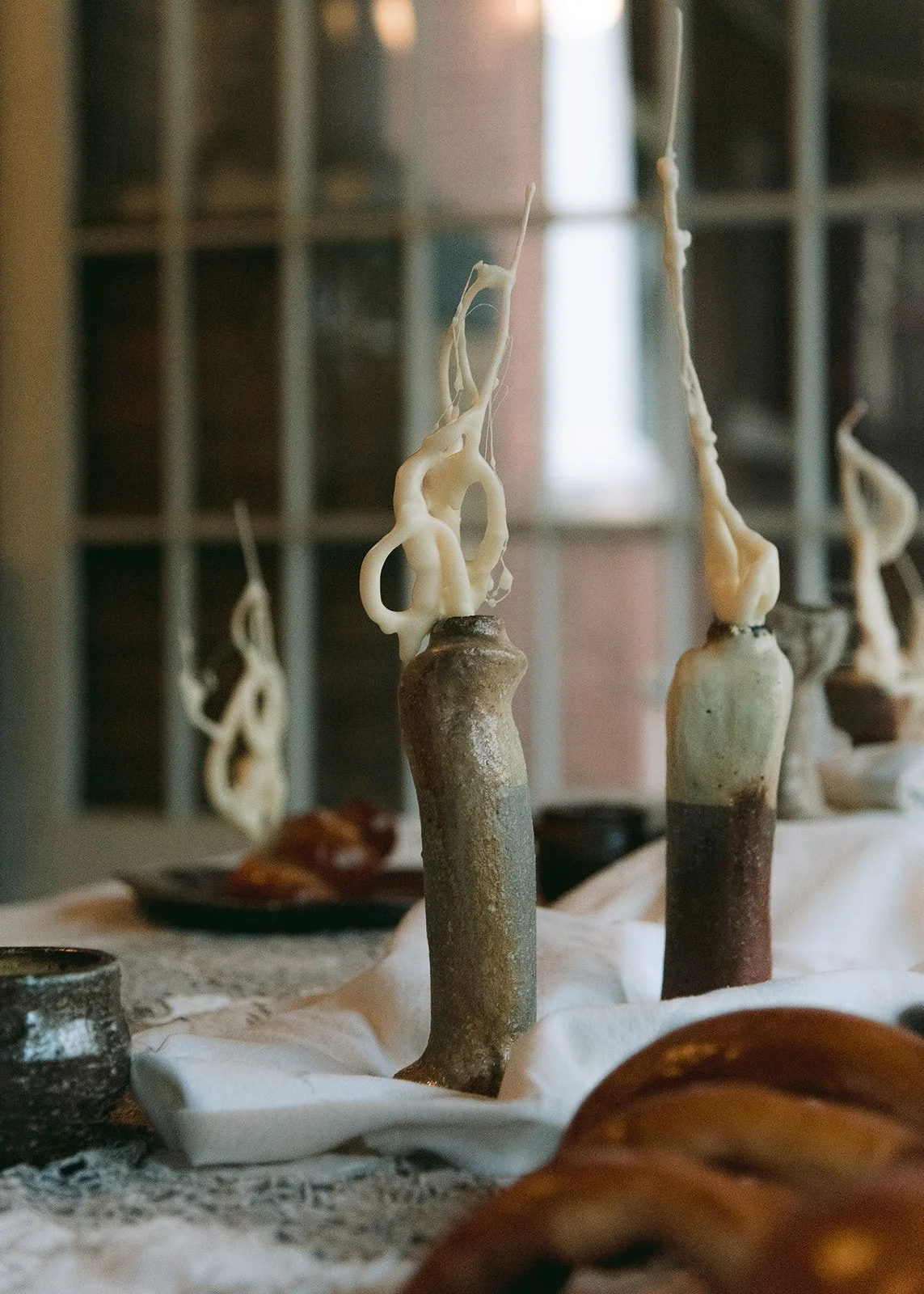 Twenty Five Hours, October 2025.
A temporal, collaborative installation curated by Na’ama Freeman, with ceramics by Jill Rosenzweig, Challah sculpture by Sidney Starkman, and candles and paper sculpture by Levana Katz.
 
Photographed by Hilary Dean.