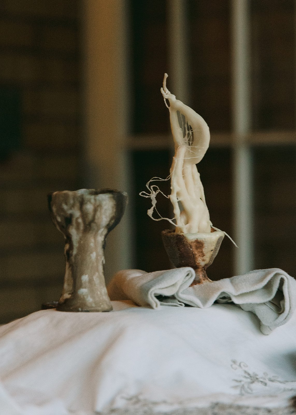 Twenty Five Hours, October 2025.
A temporal, collaborative installation curated by Na’ama Freeman, with ceramics by Jill Rosenzweig, Challah sculpture by Sidney Starkman, and candles and paper sculpture by Levana Katz.
 
Photographed by Hilary Dean.