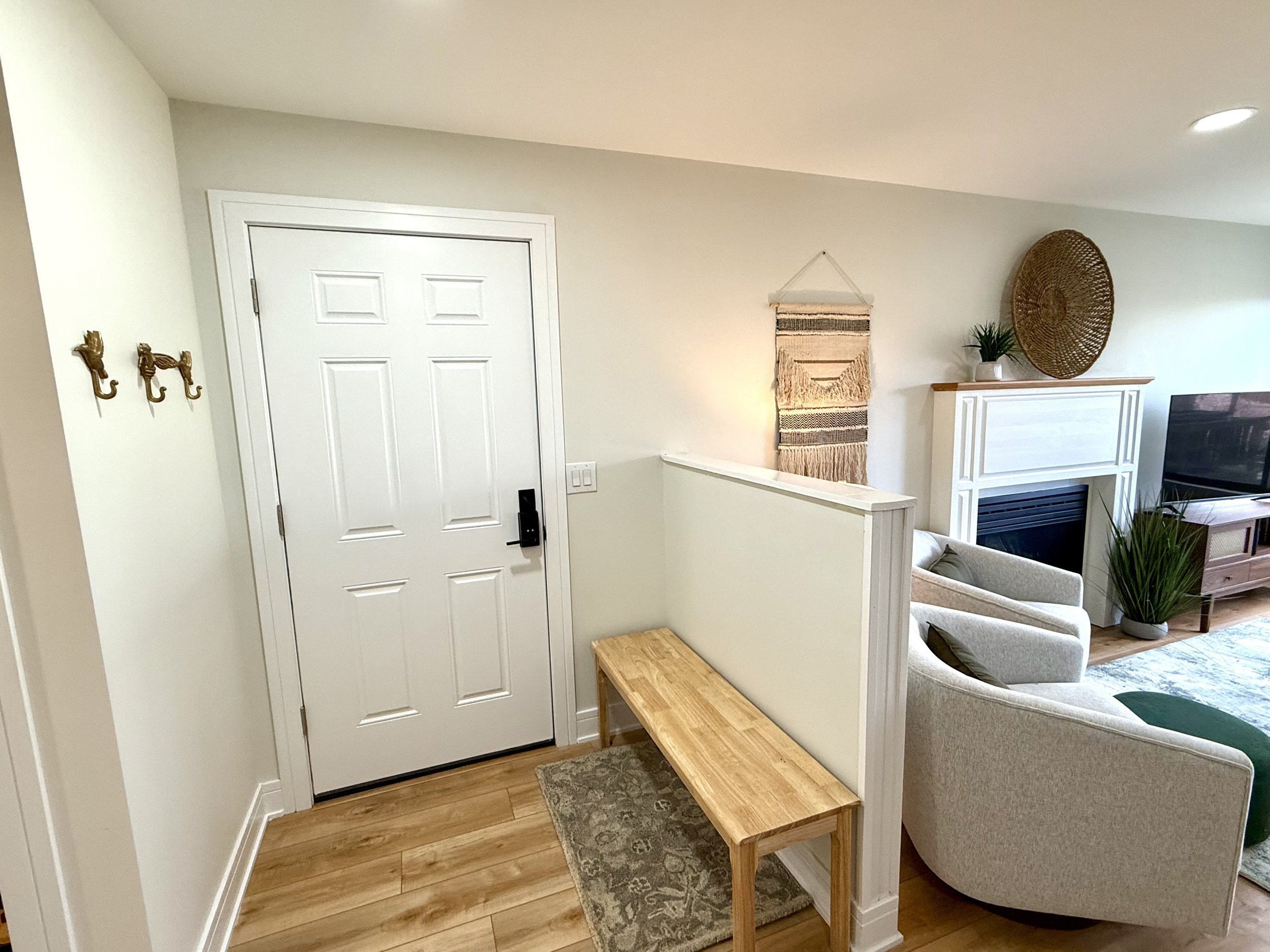 Front entry has bench and hooks