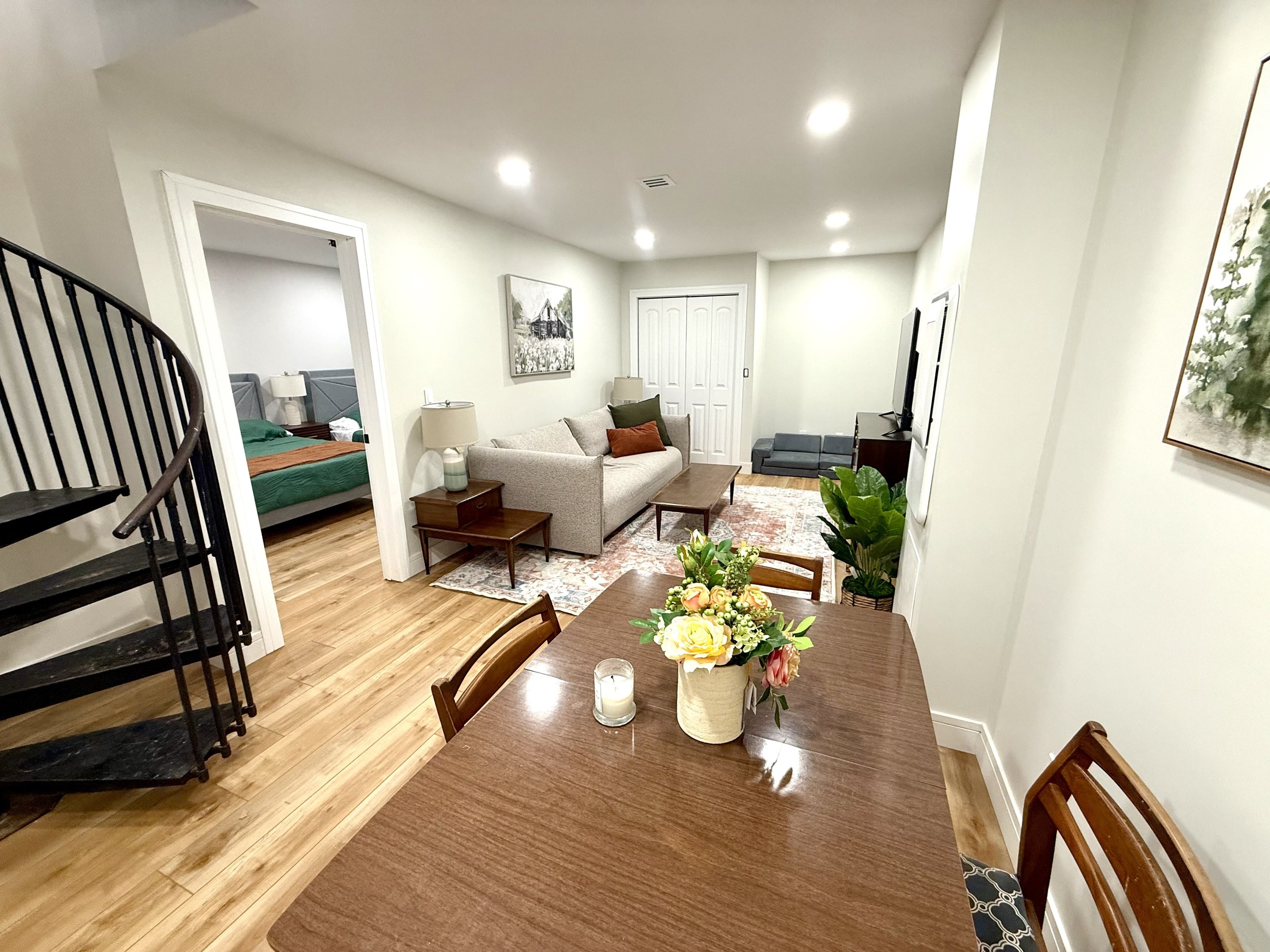 Downstairs rec room connects to both bedrooms
