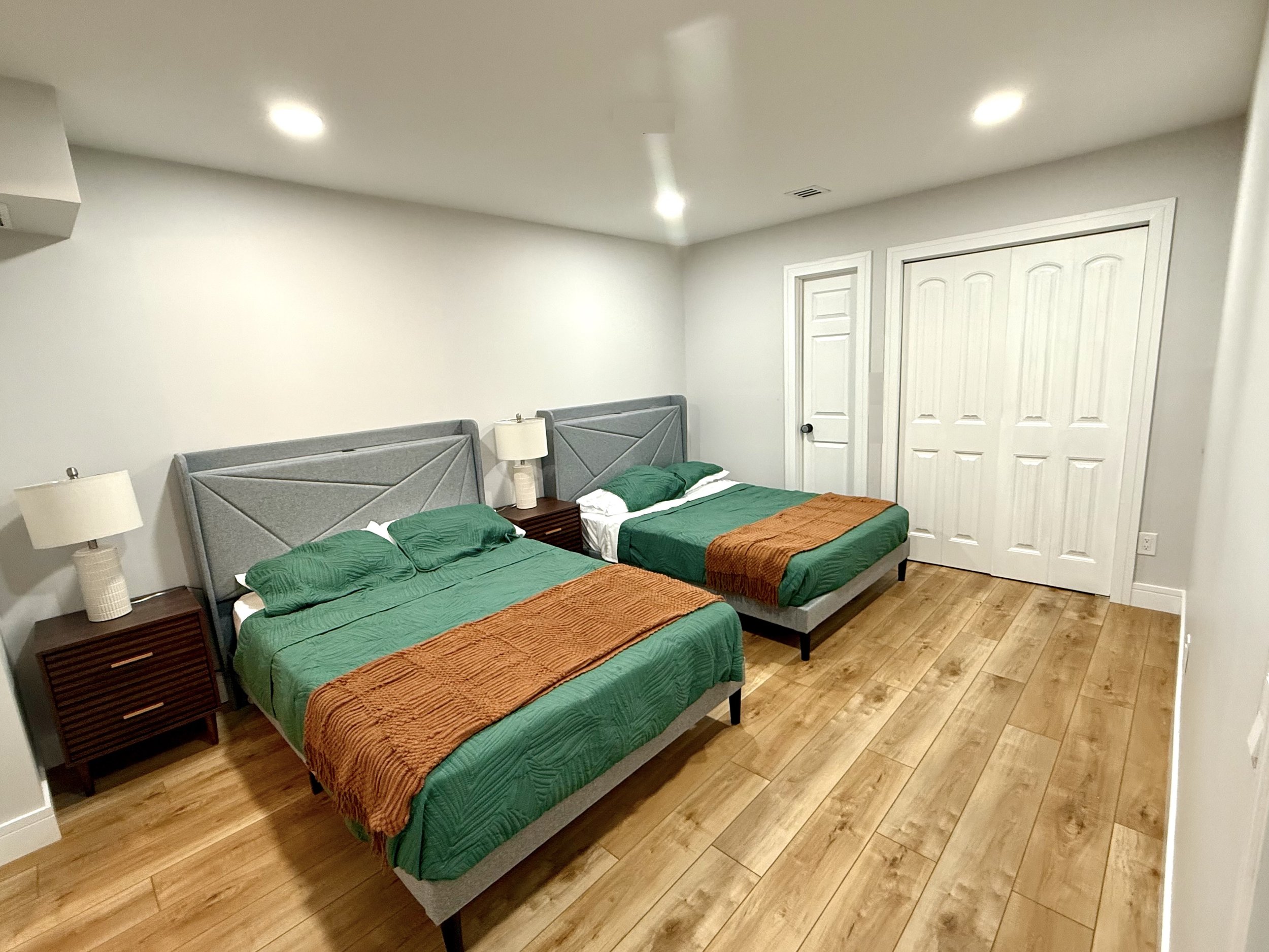 downstairs bedroom with two double beds