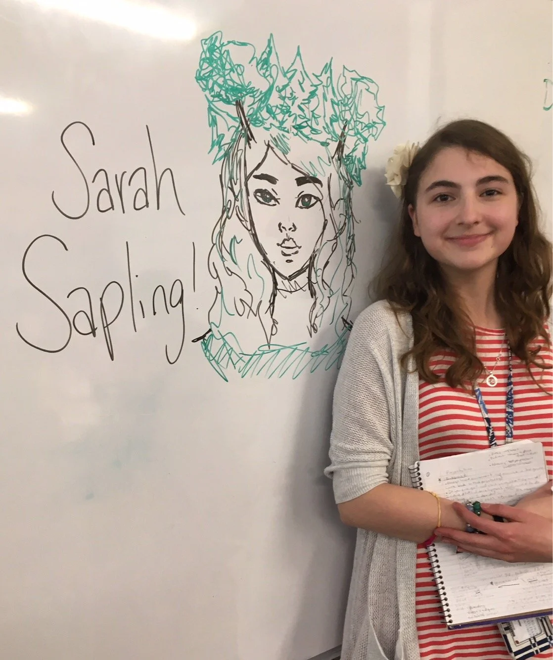 Giving a presentation at a school, my hero alter ego and nickname from the kids, "Sarah Sapling"