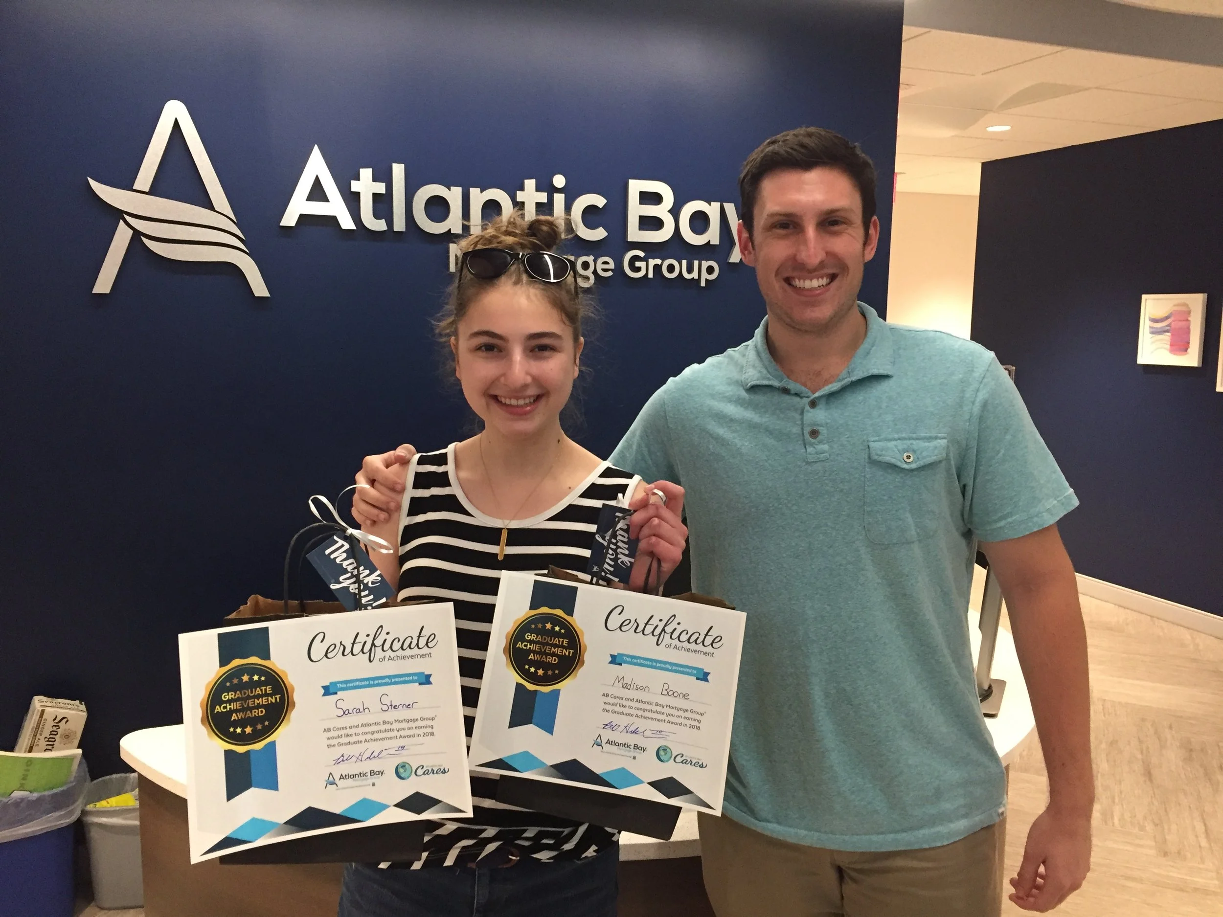 Receiving the Graduate Achievement Award from Atlantic Bay Mortgage Group