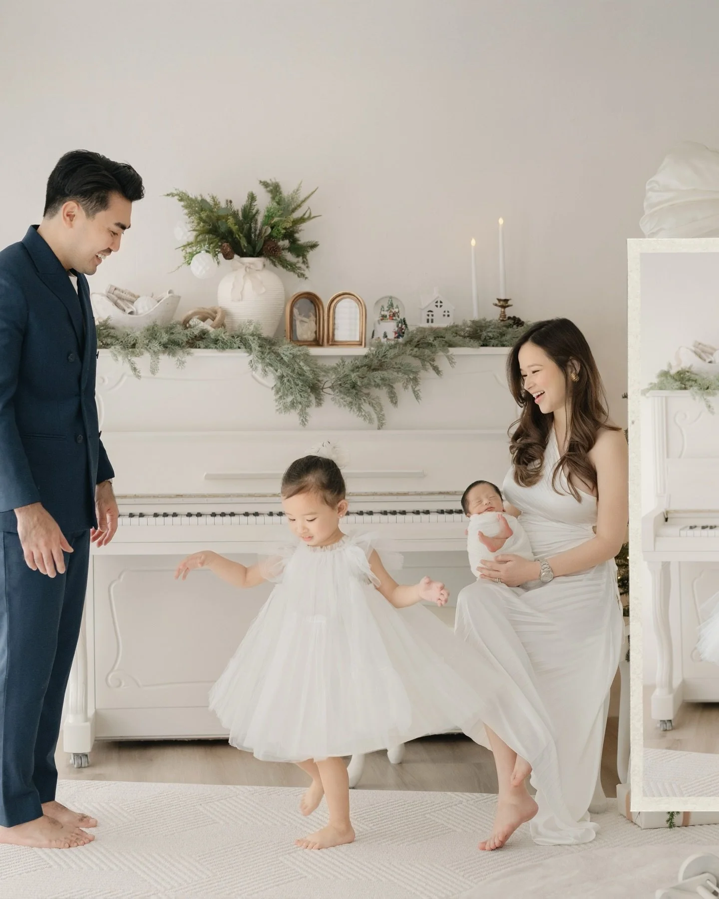 One beautiful family + one tiny new addition = the sweetest Christmas story 🤍