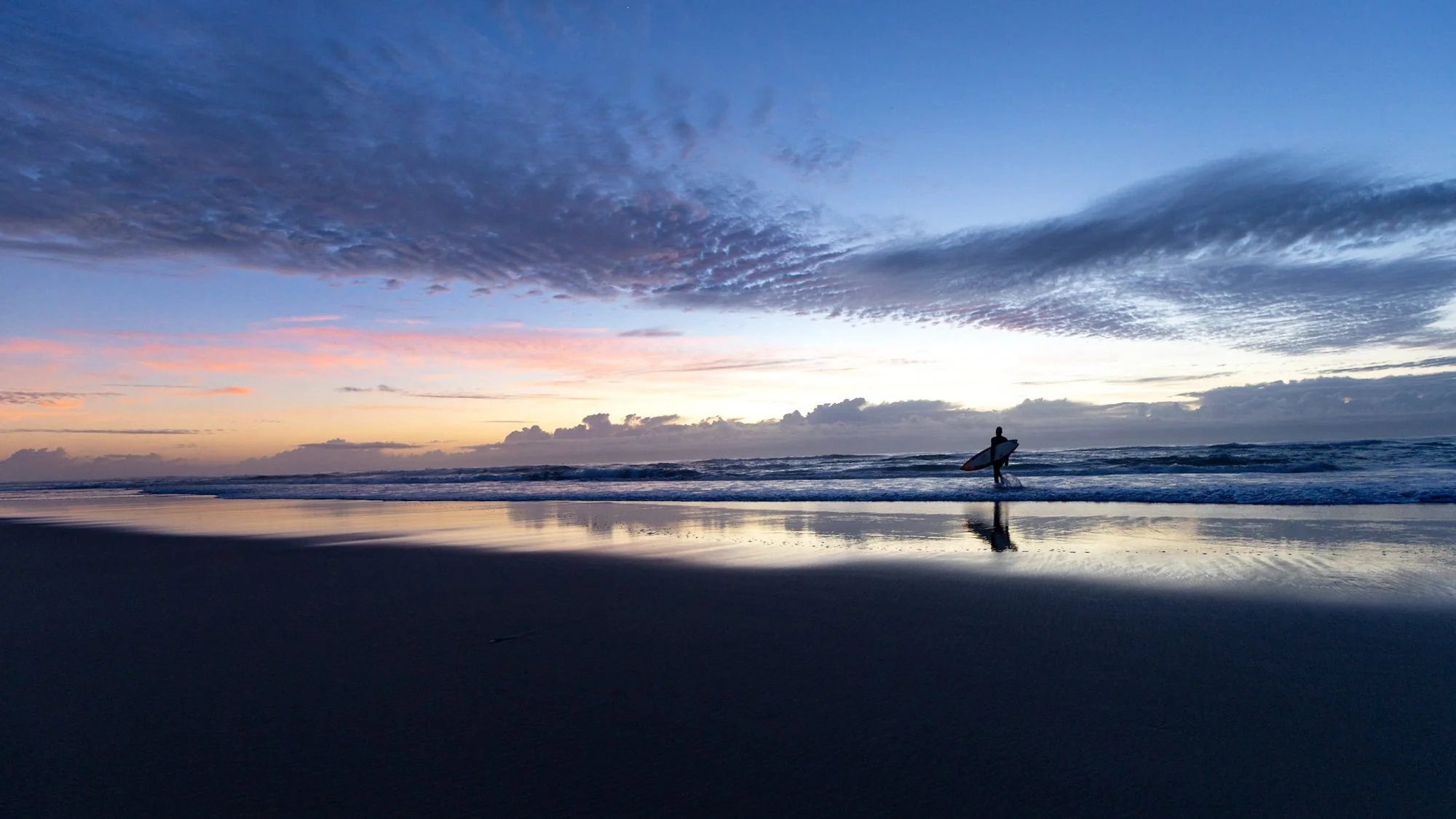 Surfer on beach QLD