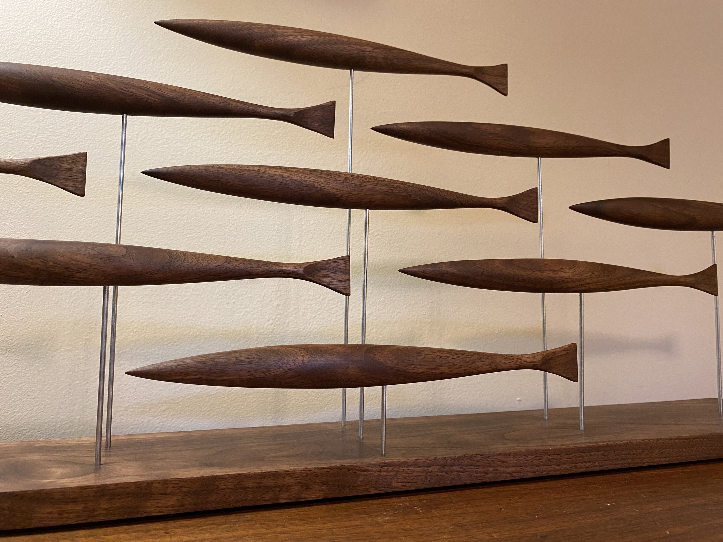 Walnut 9 fish table sculpture