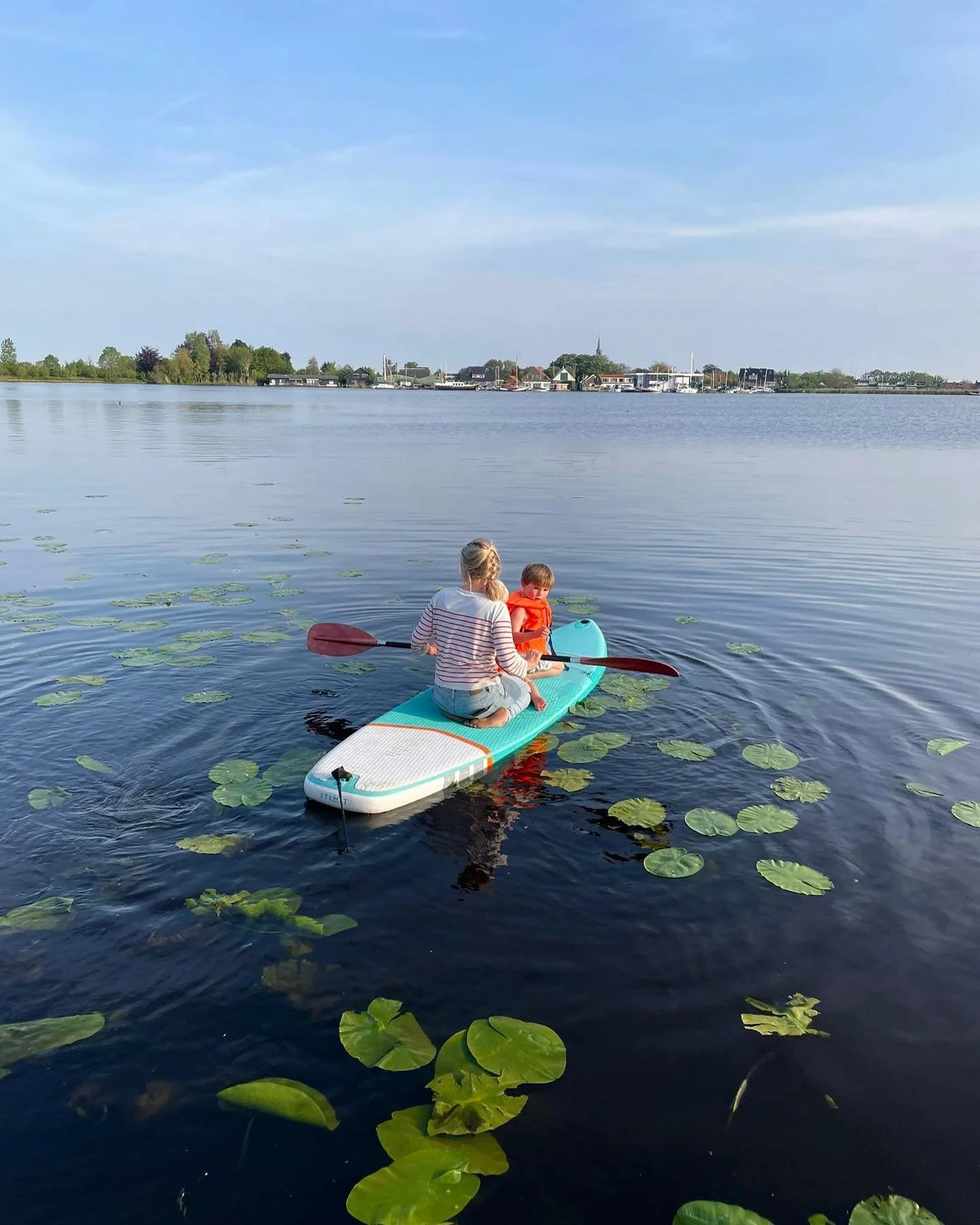 stand up paddle boards, wrestling, rock collecting, dandelion picking, fishing and mud… a weekend with boys.