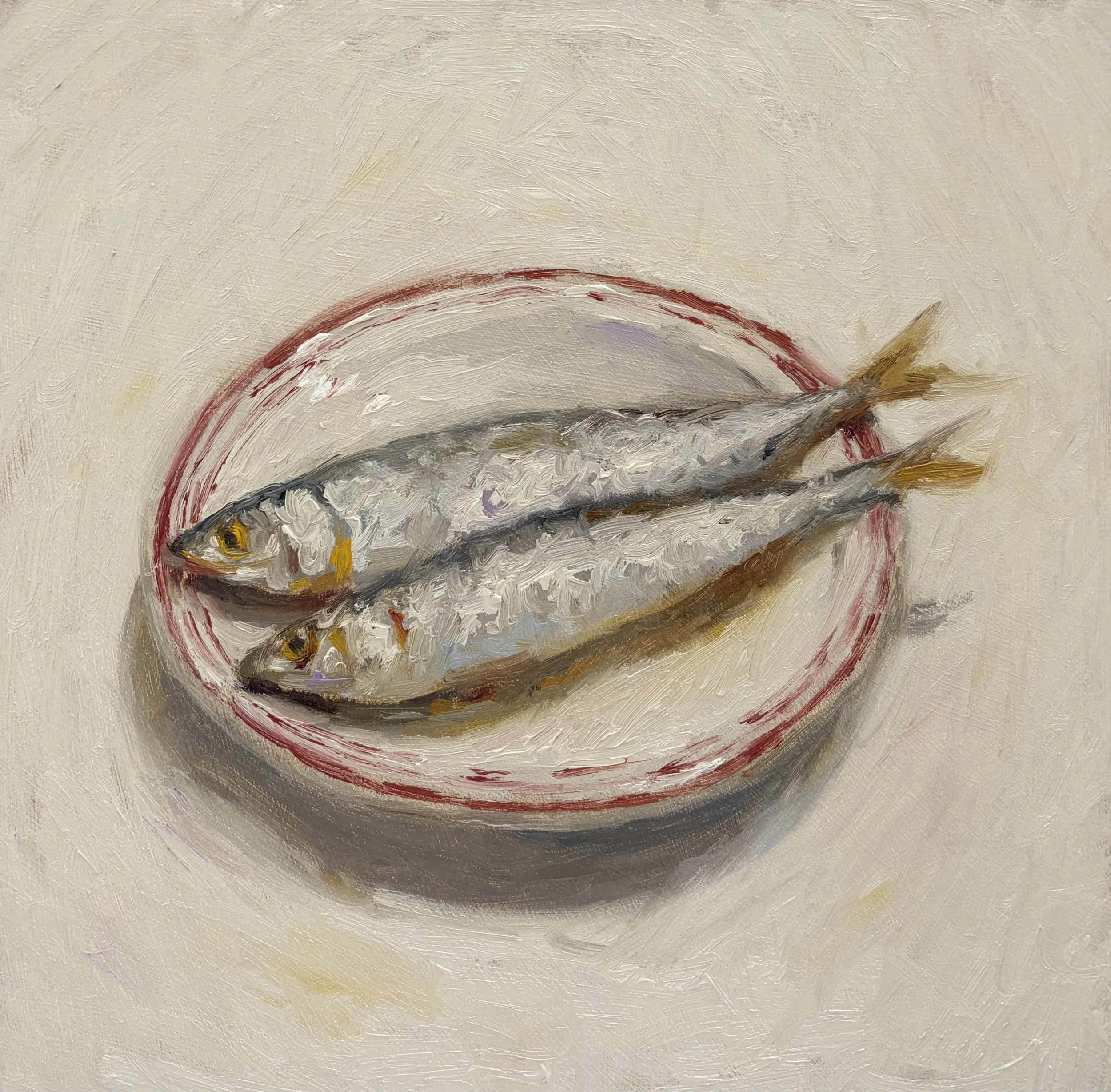 Sardines on a red plate.jpg
