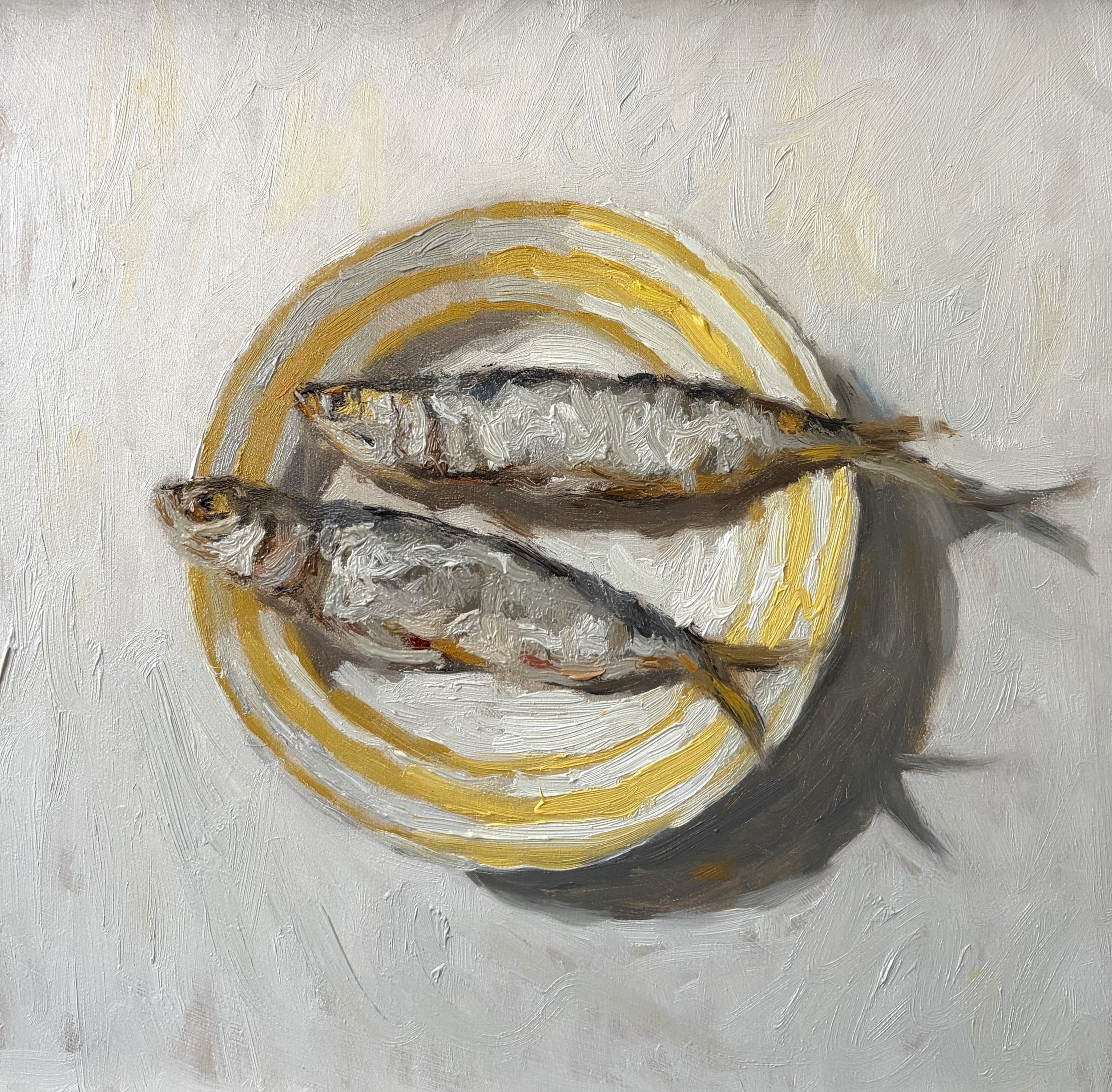 Sardines on a yellow plate