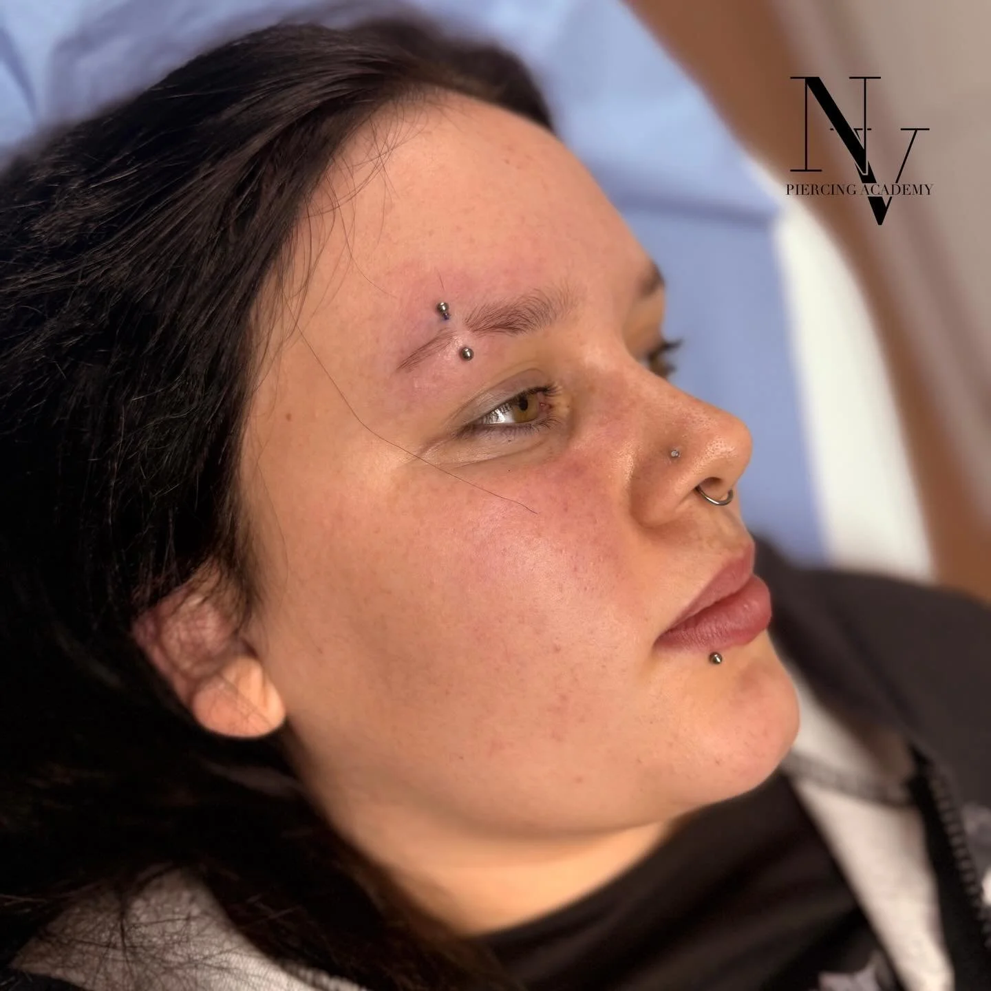 Eyebrow piercing by student Tamara 🫶🏻

Tamara has now passed the body piercing training course!
Amazing work, well done 👏🏻

If you are interested in training to become a body piercer please get in touch!
Send us a message - or email us :
nvpierci