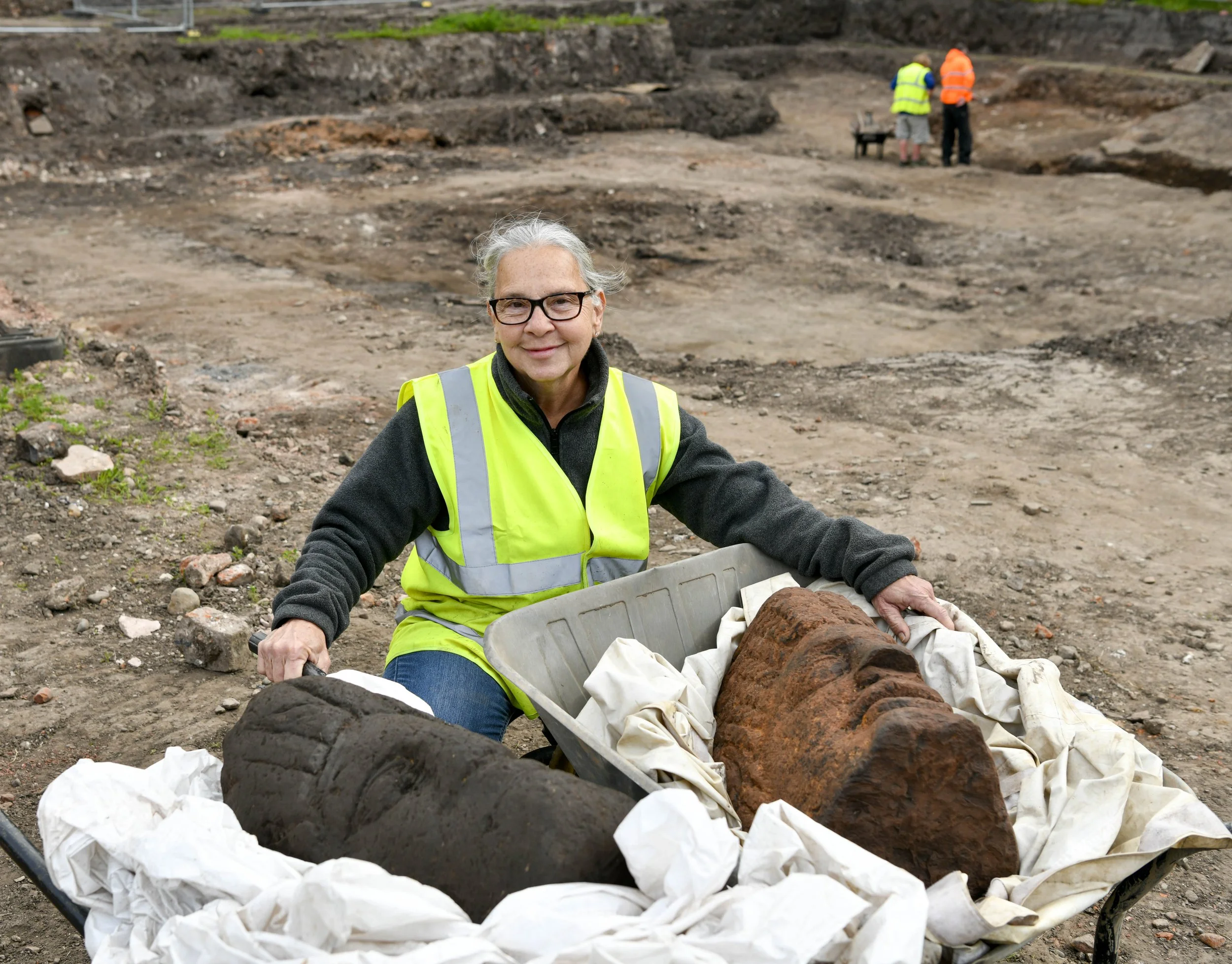 Carolyn, a retired nurse from Indiana, on her first day on an archaeological dig uncovered the first head. 