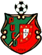 Vereinswappen mit einem Fußball, einem grünen Hintergrund, einem roten Schild, einem weißen Stern und den Buchstaben 'PUCUD' auf der linken Seite.