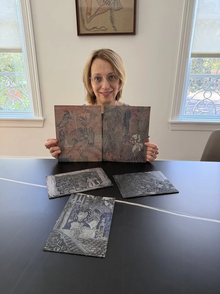 Rufina Shteynberg is holding her linogravures blocks