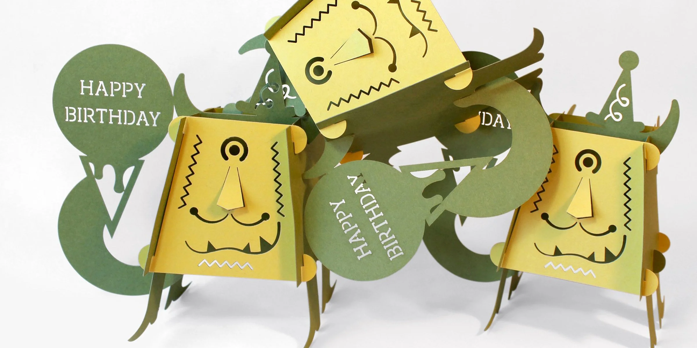    Smidge Co. is a family of friendly, nonsensical 3-d cards that fold flat and travel through snail mail.   I began tinkering with three dimensional cards when creating my wedding invitation and save the date. I wanted to develop a card that I could